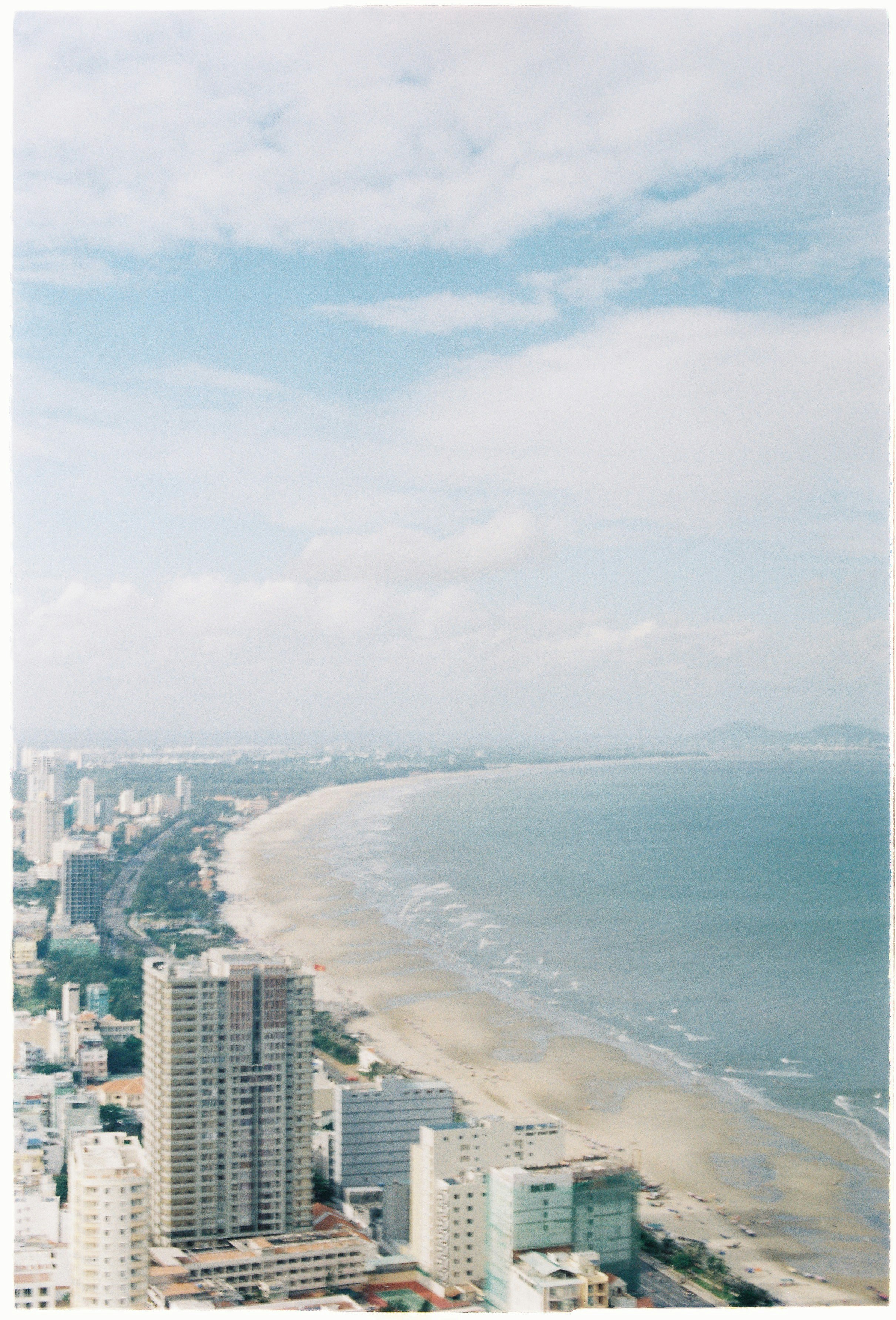Aerial View of Coastal City Beach