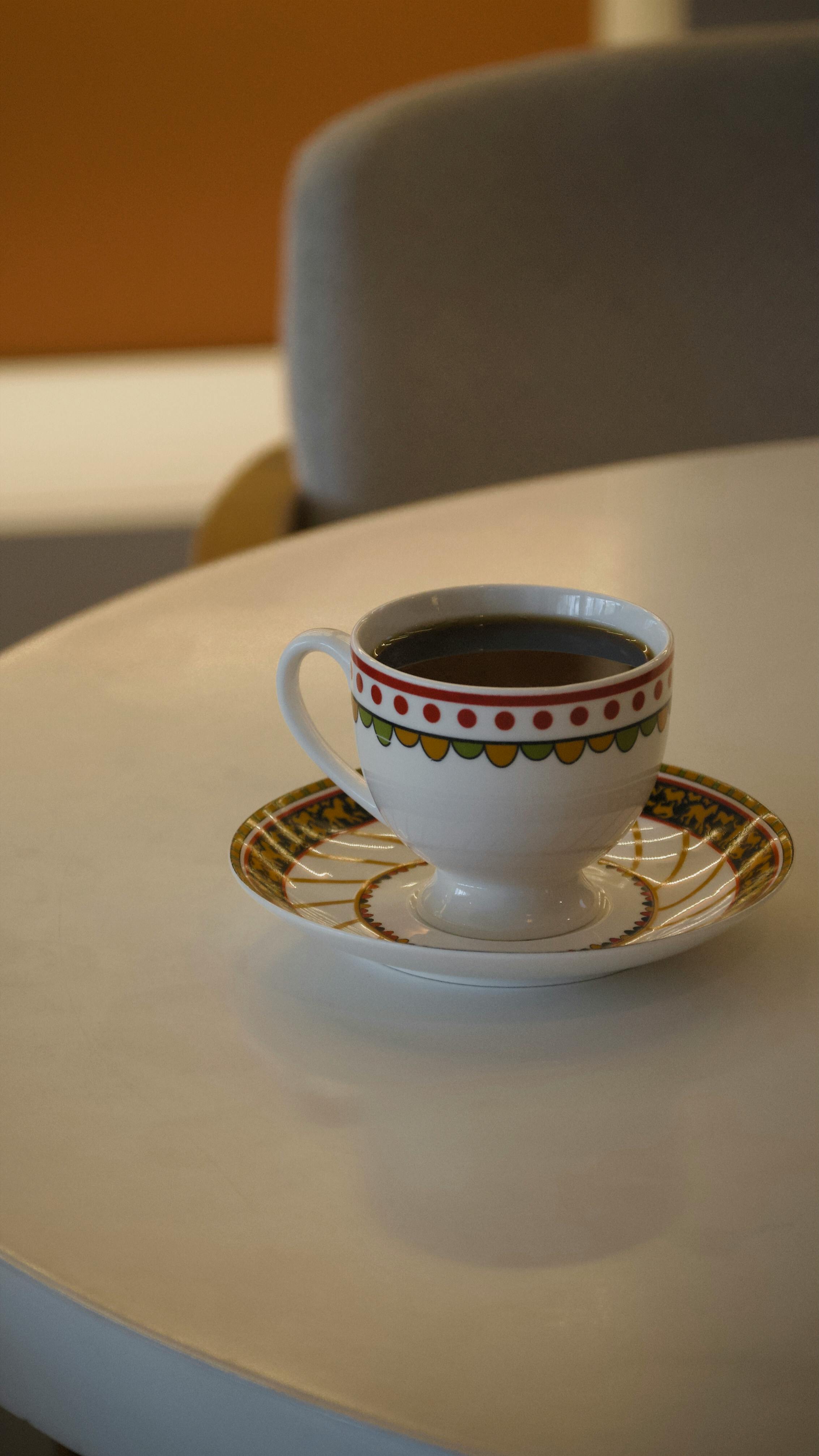 Cup of Black Coffee on Table