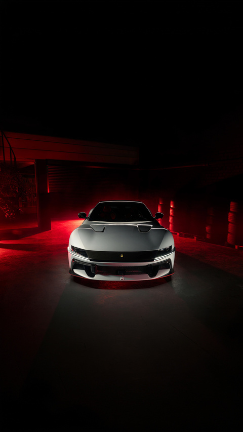 White Ferrari Sports Car in Dark Setting