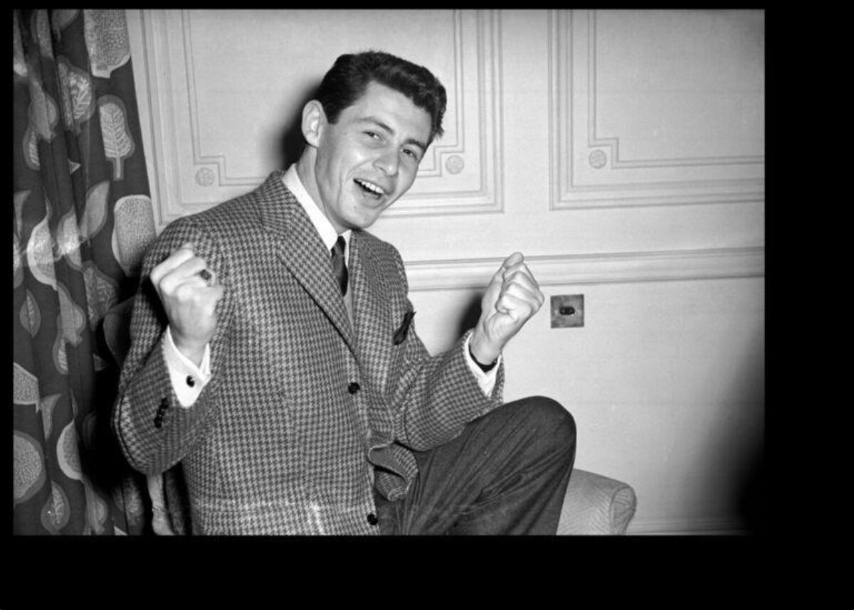 Joyful Young Man In Celebratory Pose