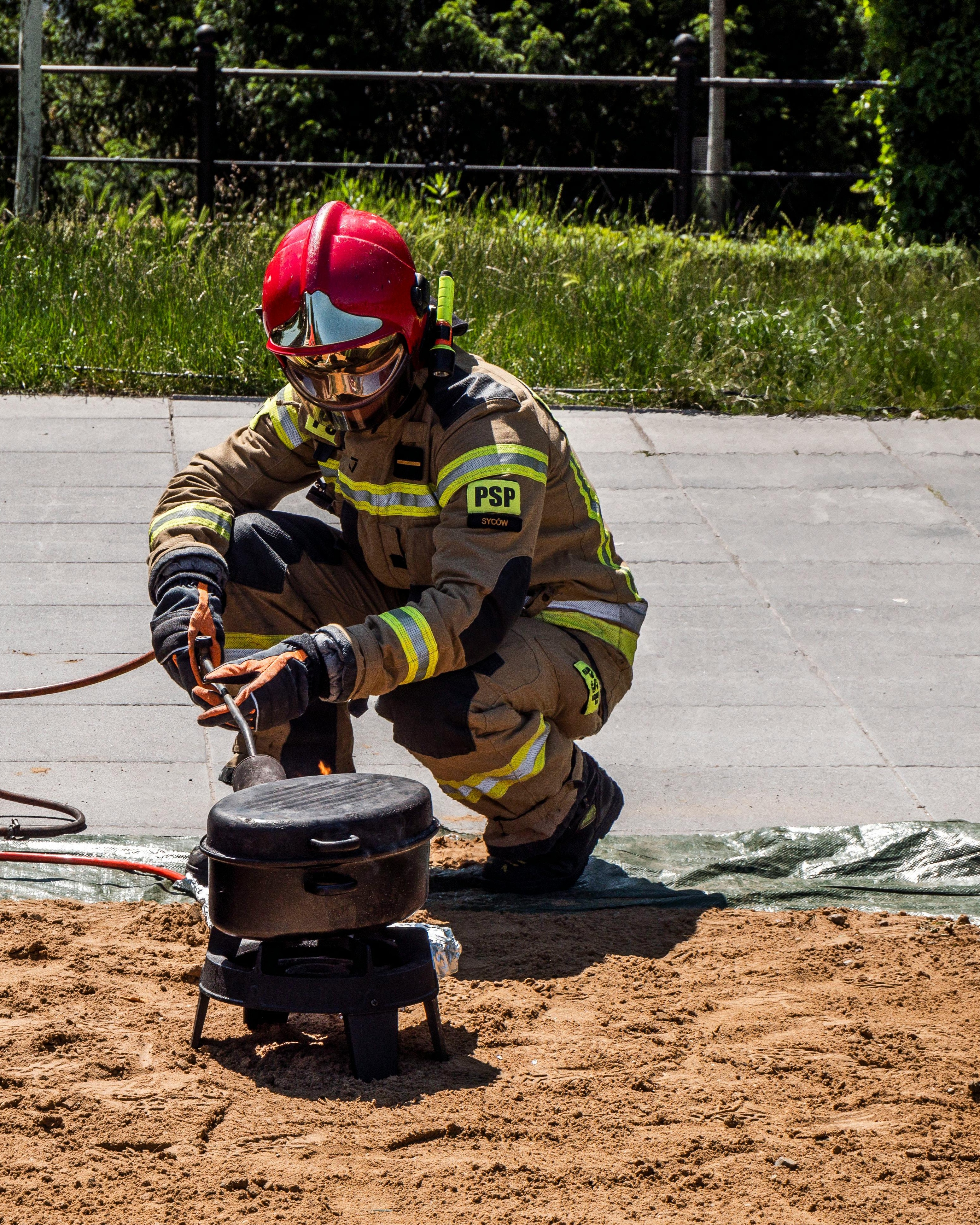 Firefighter Preparing Outdoor Cooking