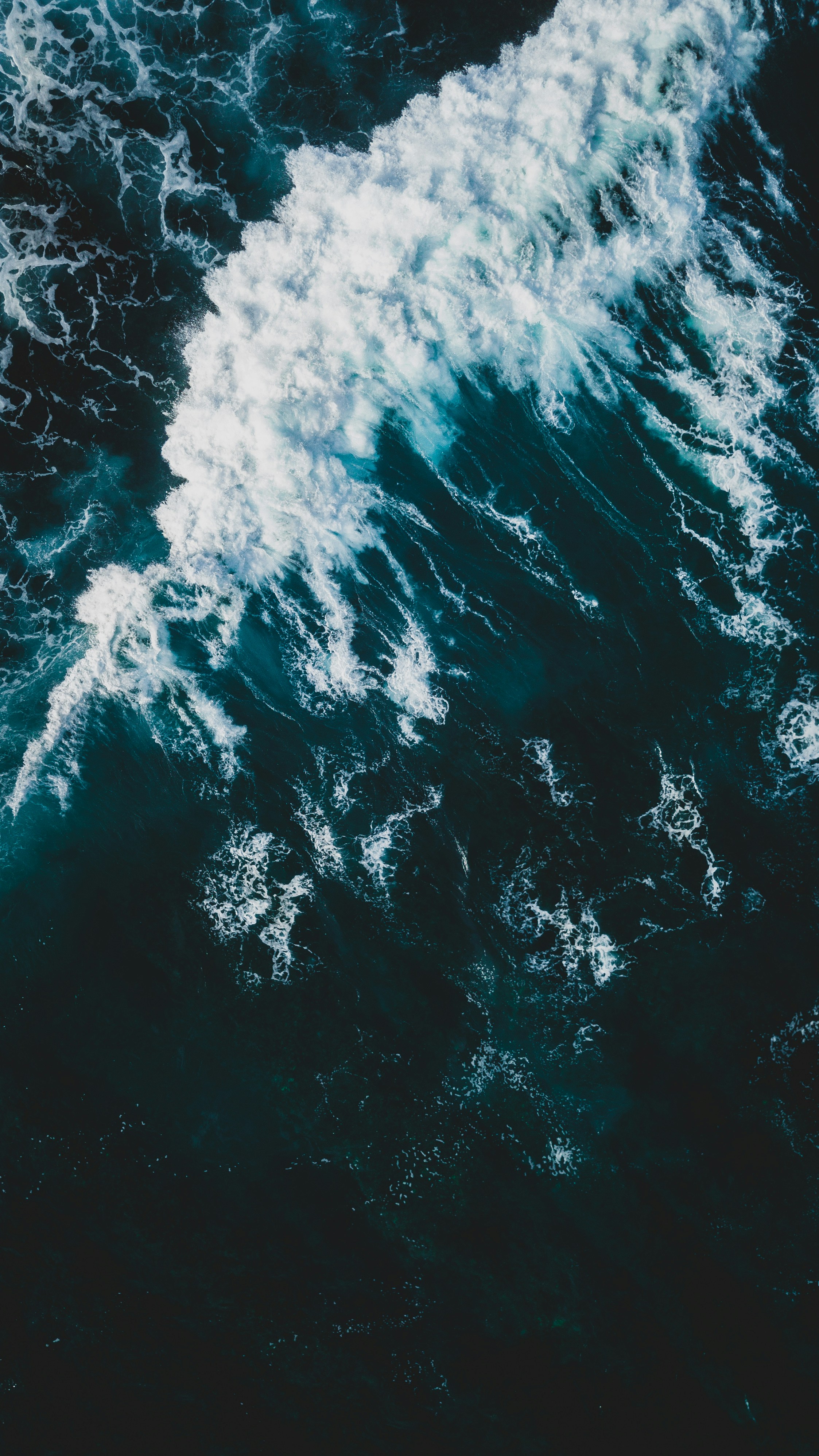 Aerial View of Breaking Ocean Wave