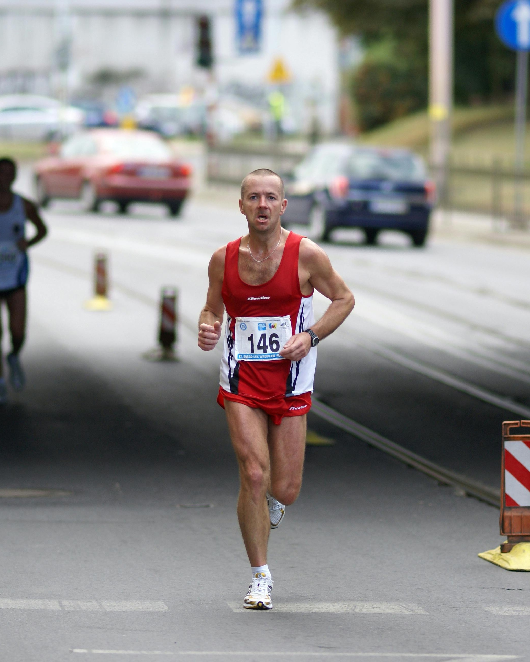 Marathon Runner 146 Competing on City Road