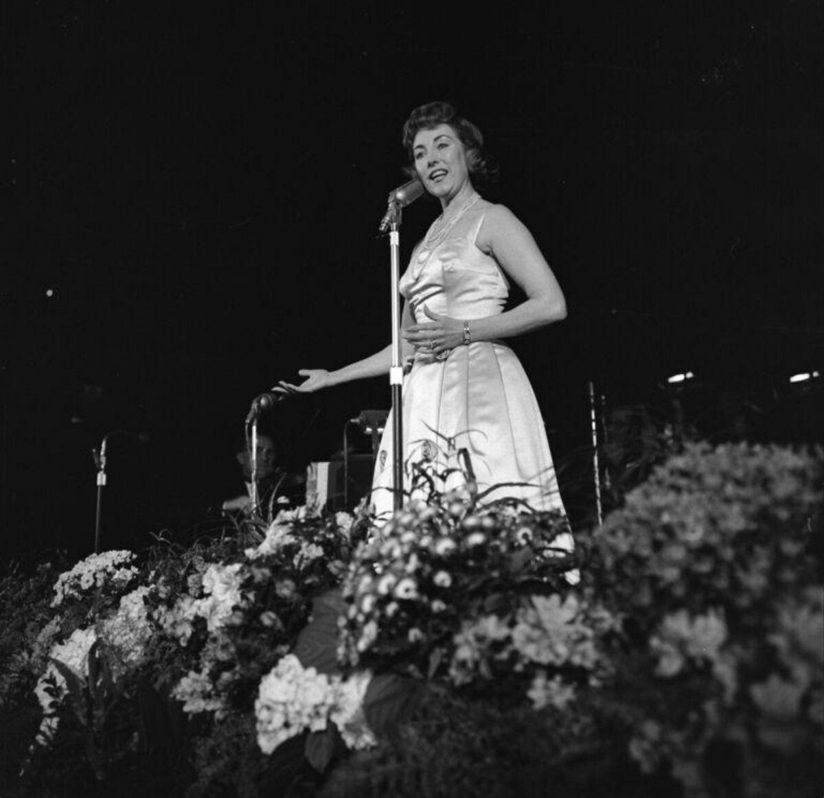 Female Singer Performing On Stage
