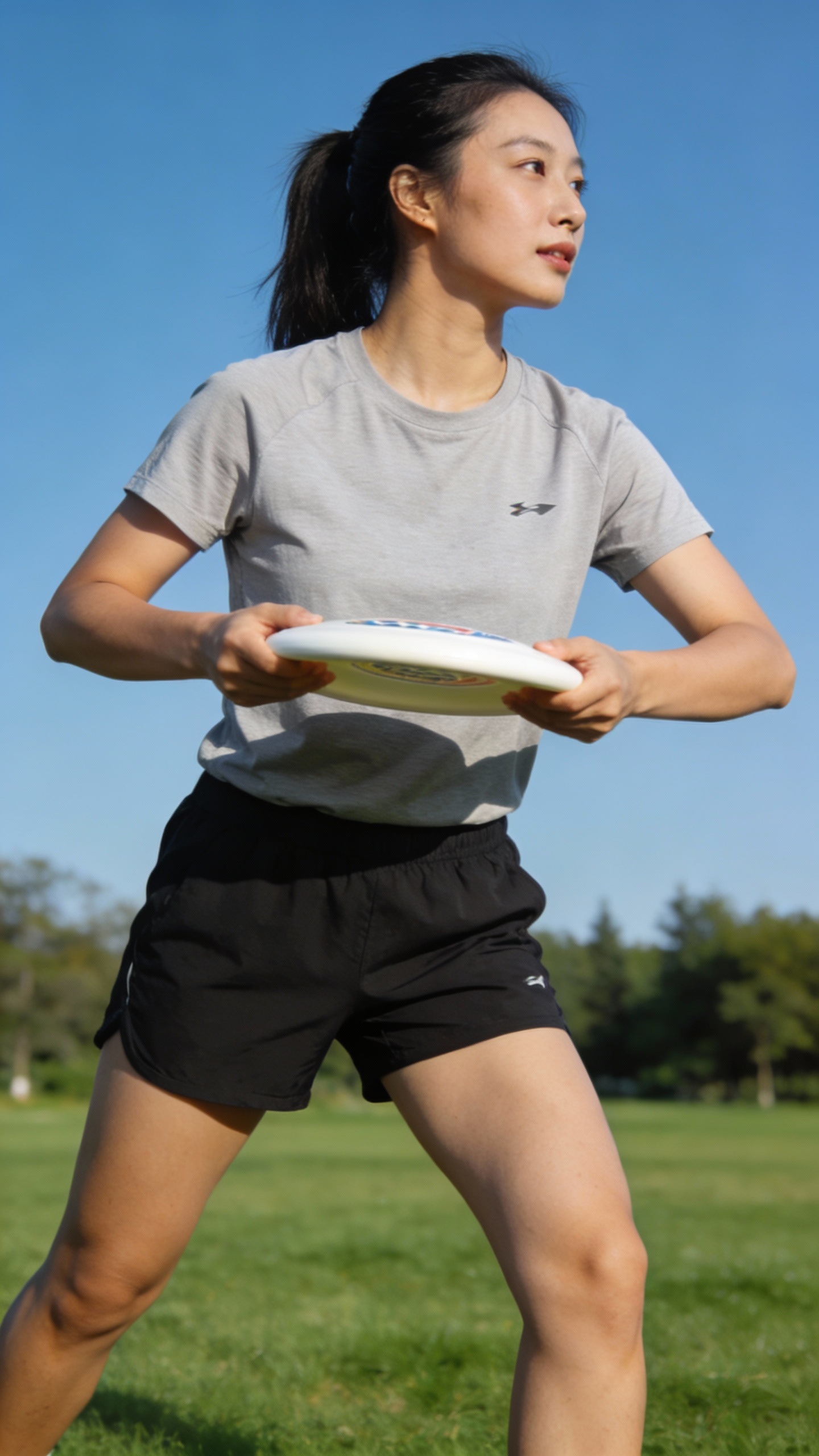 Woman Preparing to Throw Frisbee