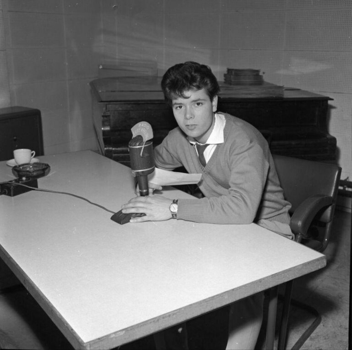 Young Man At Radio Studio Microphone