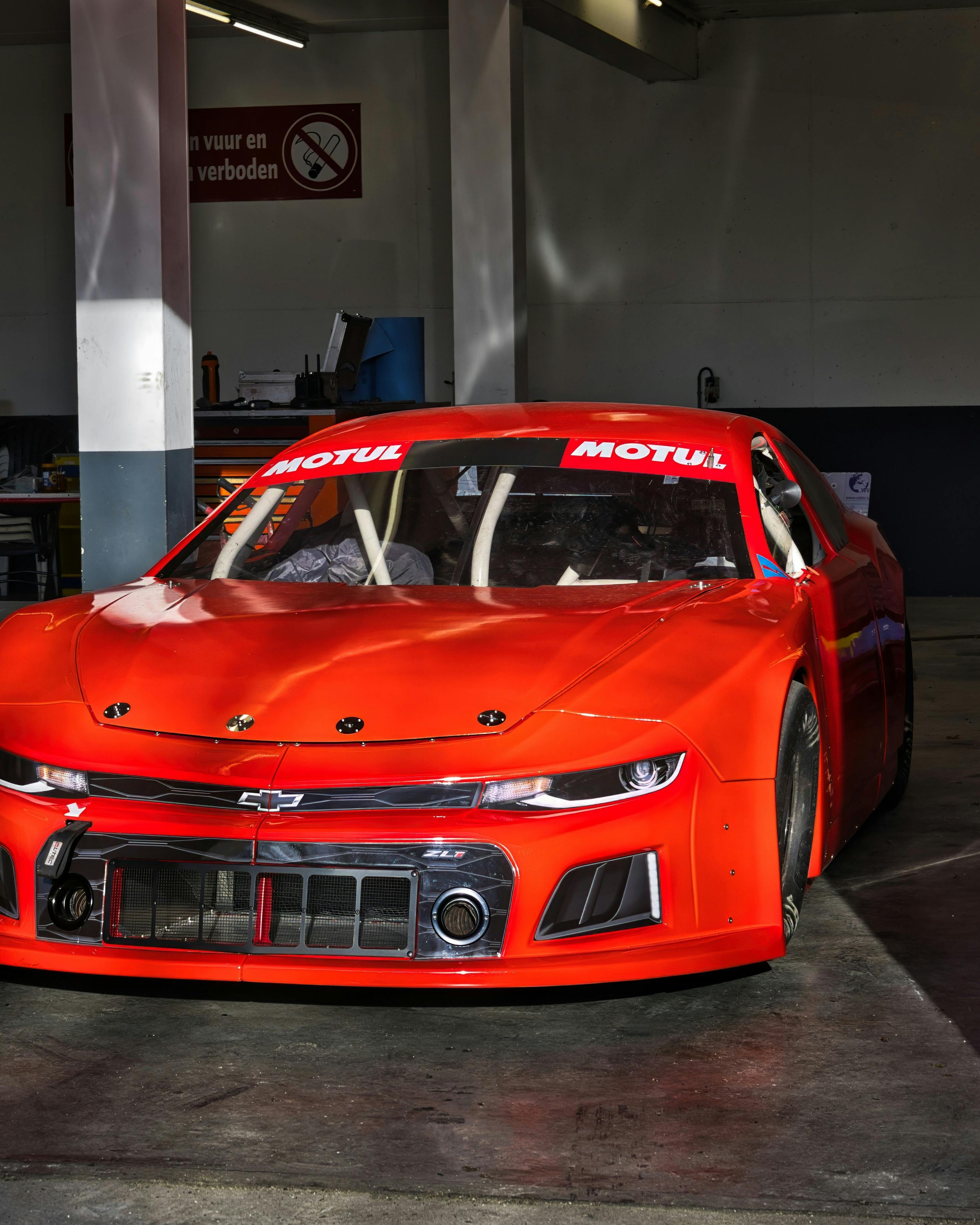 Red Chevrolet ZL1 Race Car In Garage