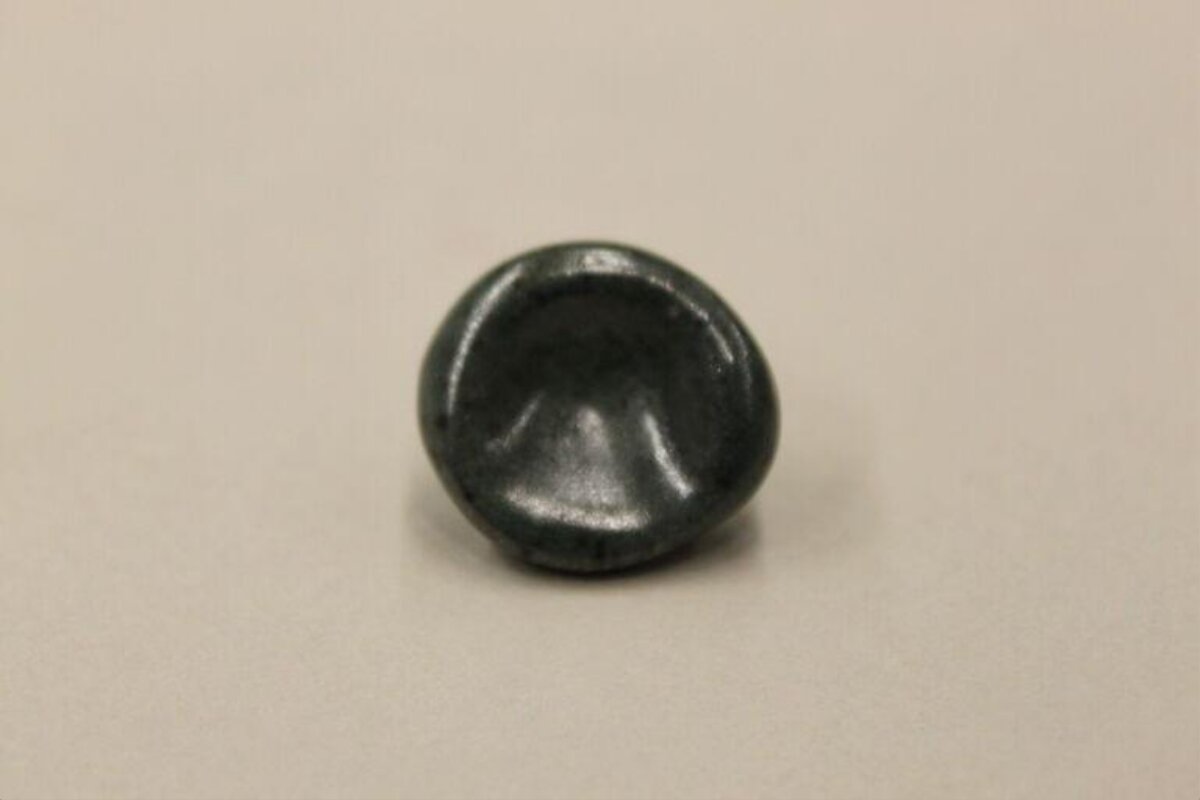 Dark Indented Round Stone