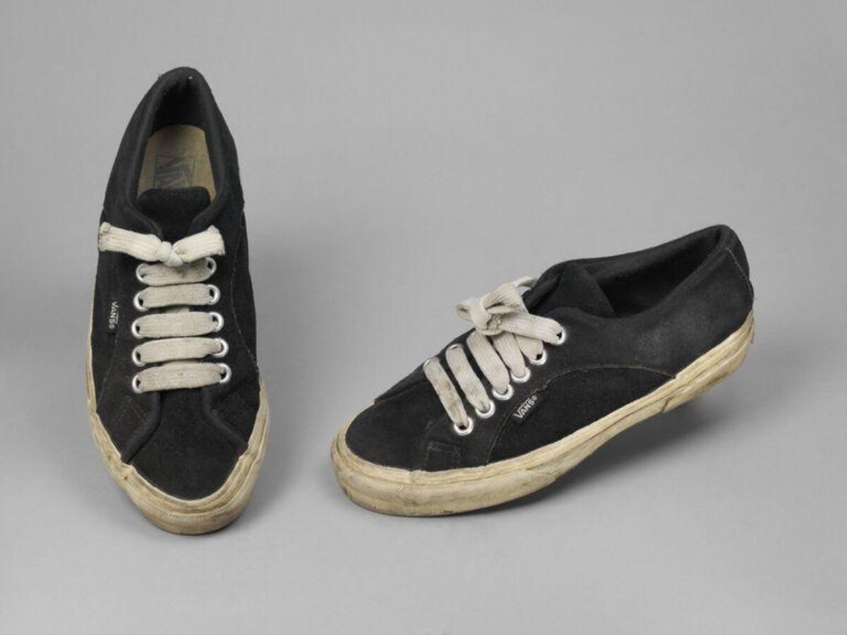 Worn Black Vans Sneakers