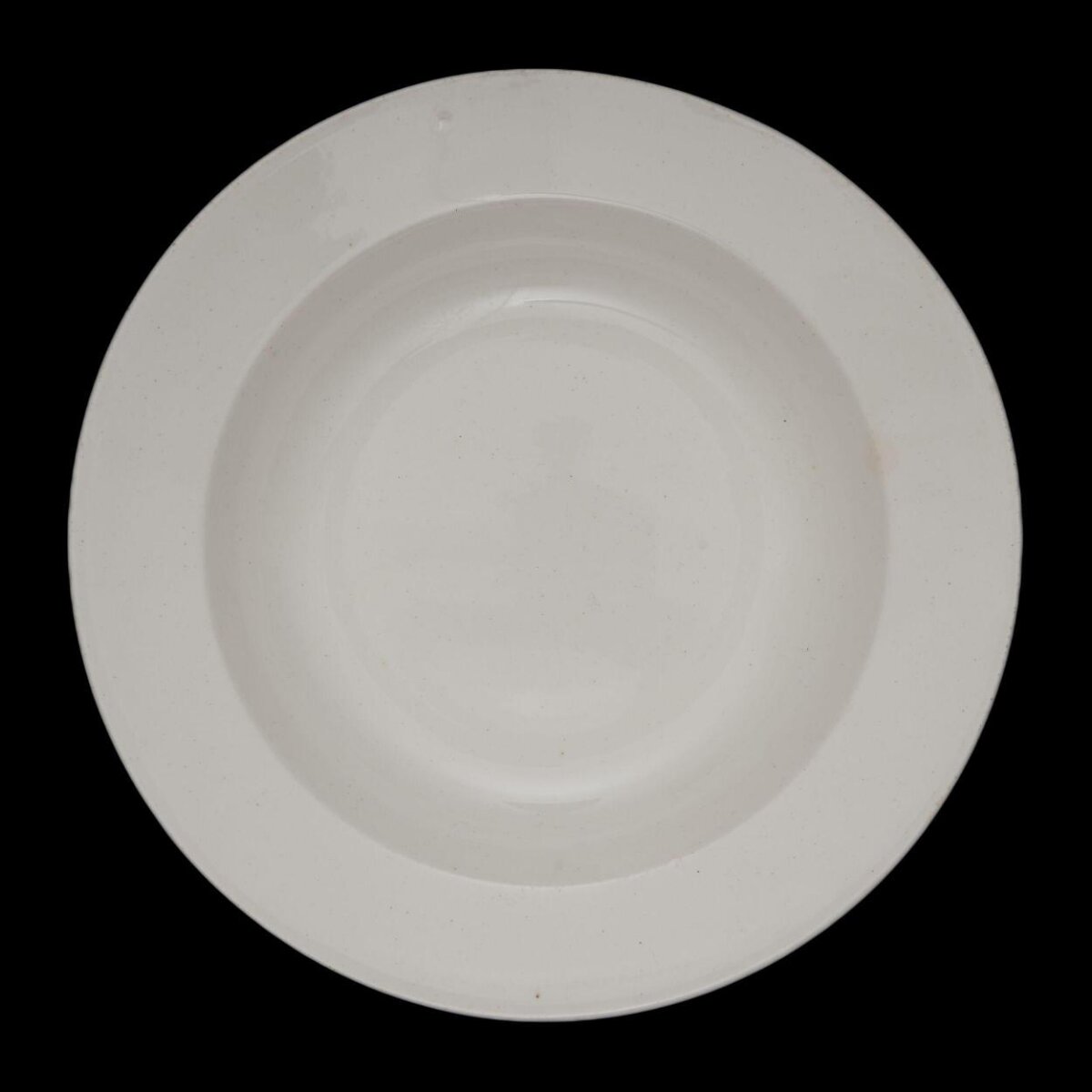 Empty White Ceramic Plate on Black Background