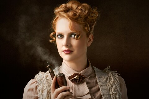 Red-haired Steampunk Woman With Smoking Pipe