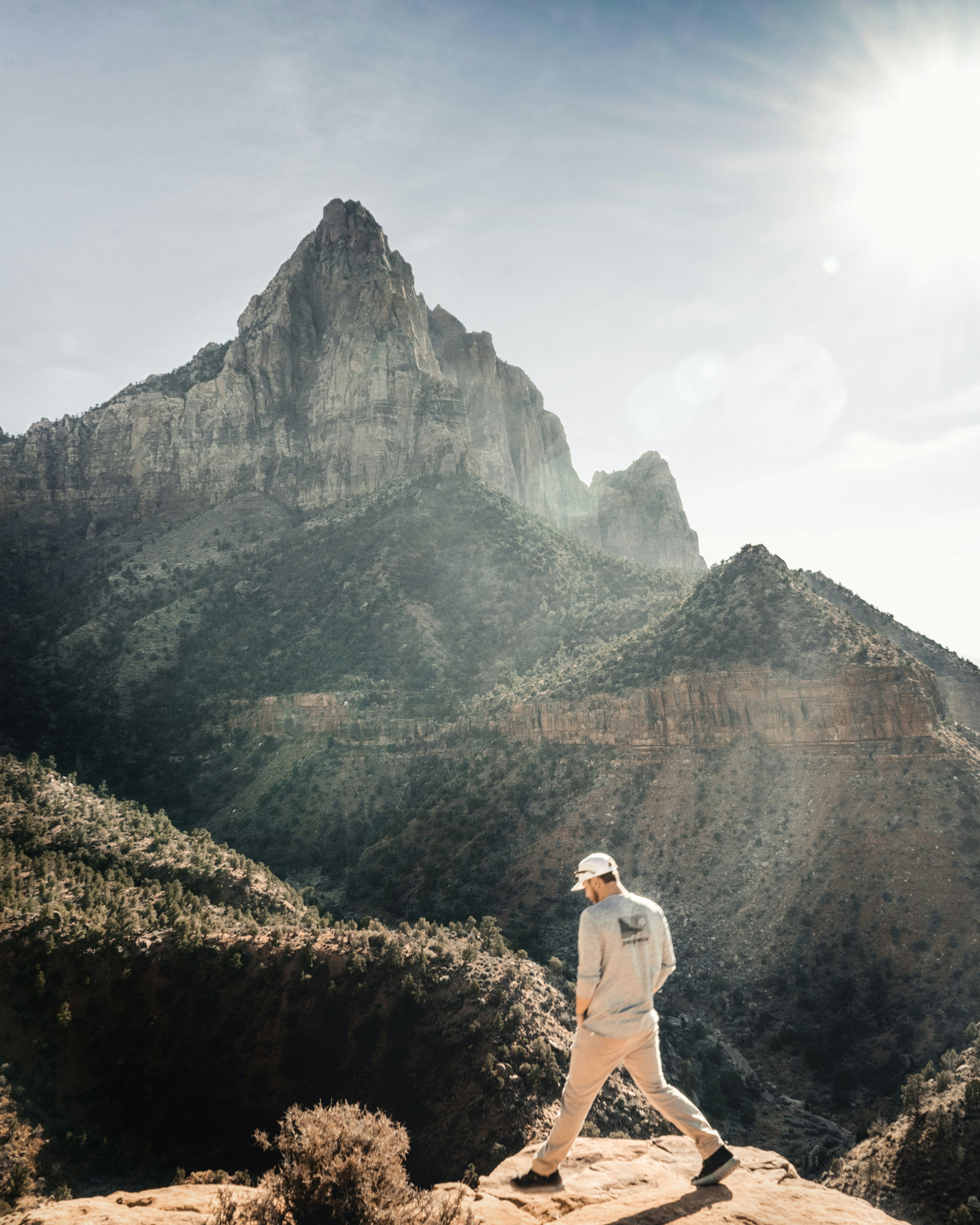 Hiker Overlooking Mountain Peak