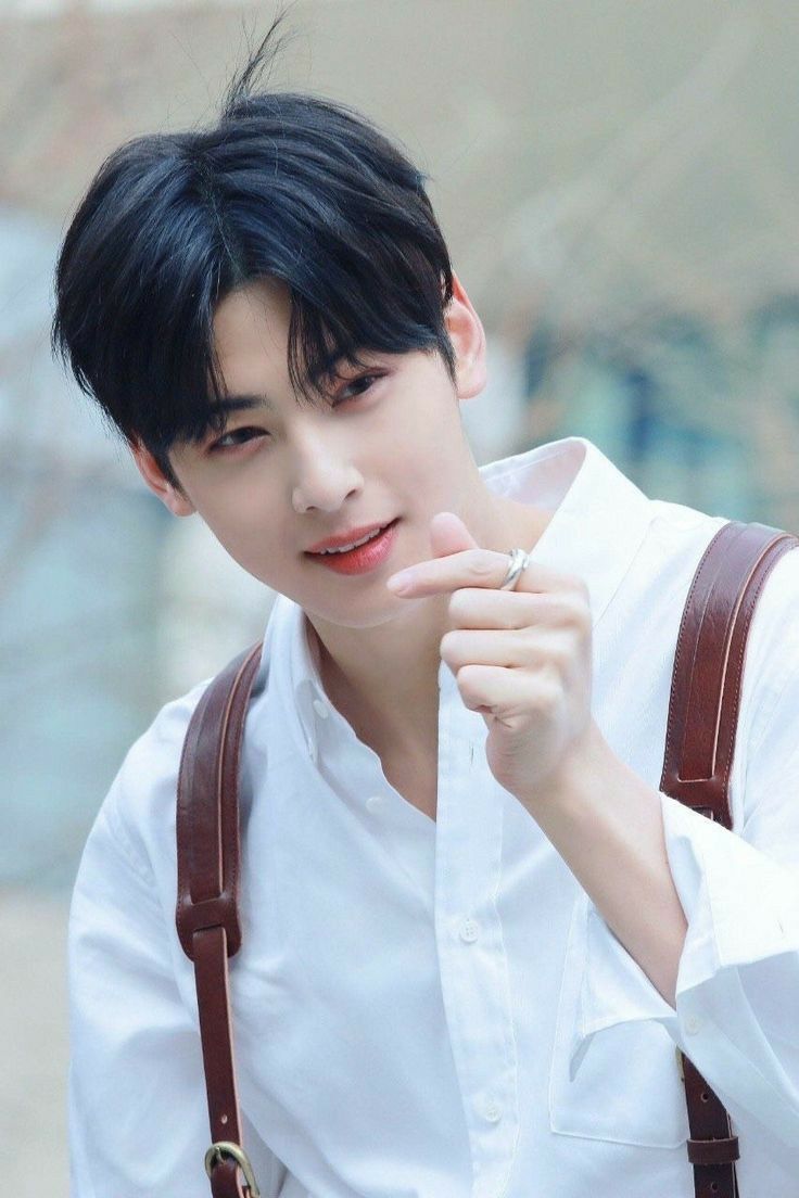 Young Man Making Finger Heart Gesture