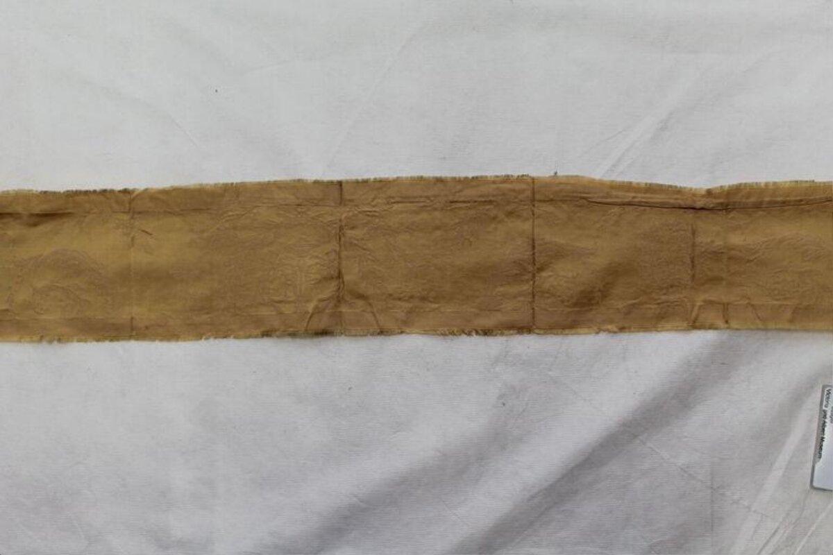 Tan Fabric Strip on White Background