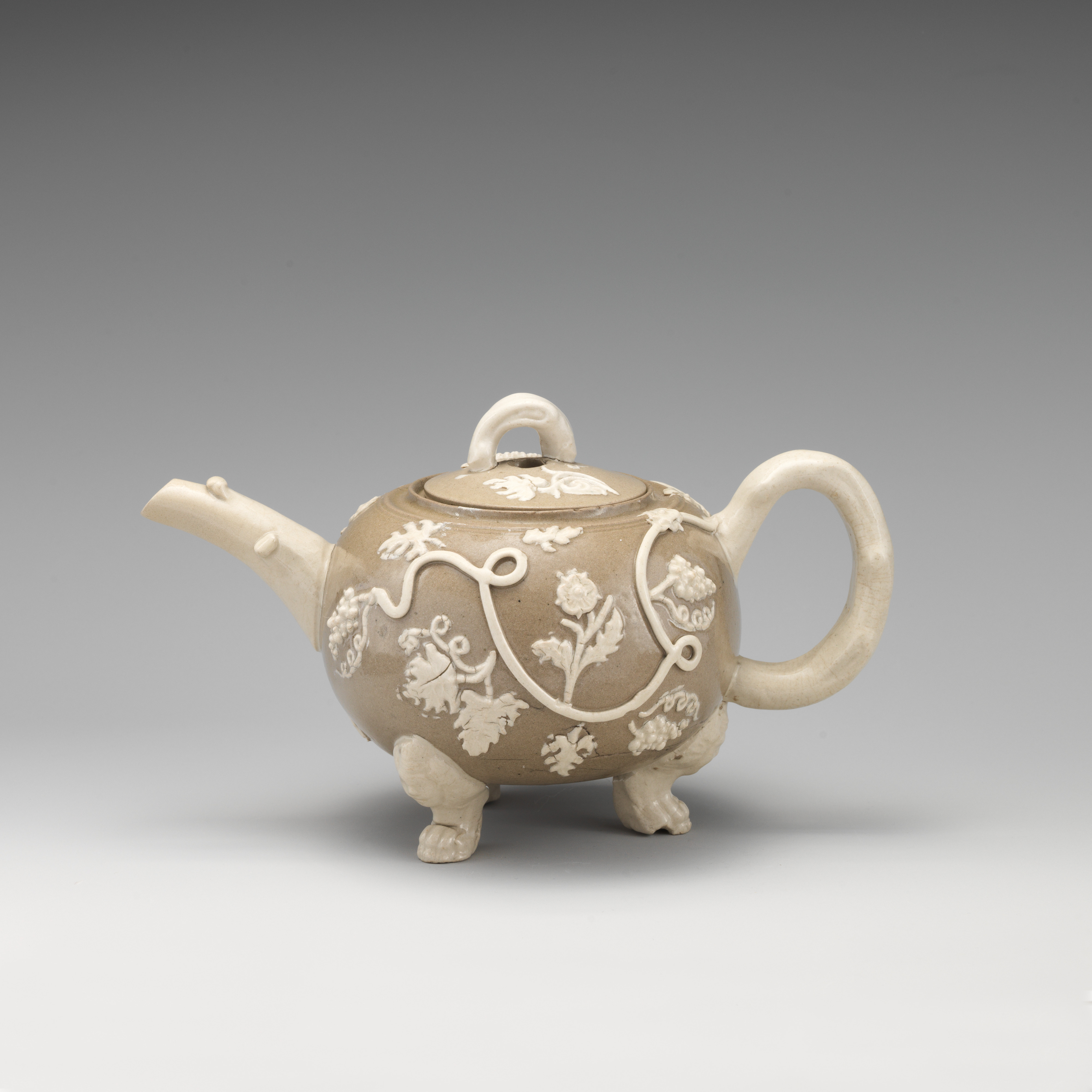 Beige Relief Carved Porcelain Teapot