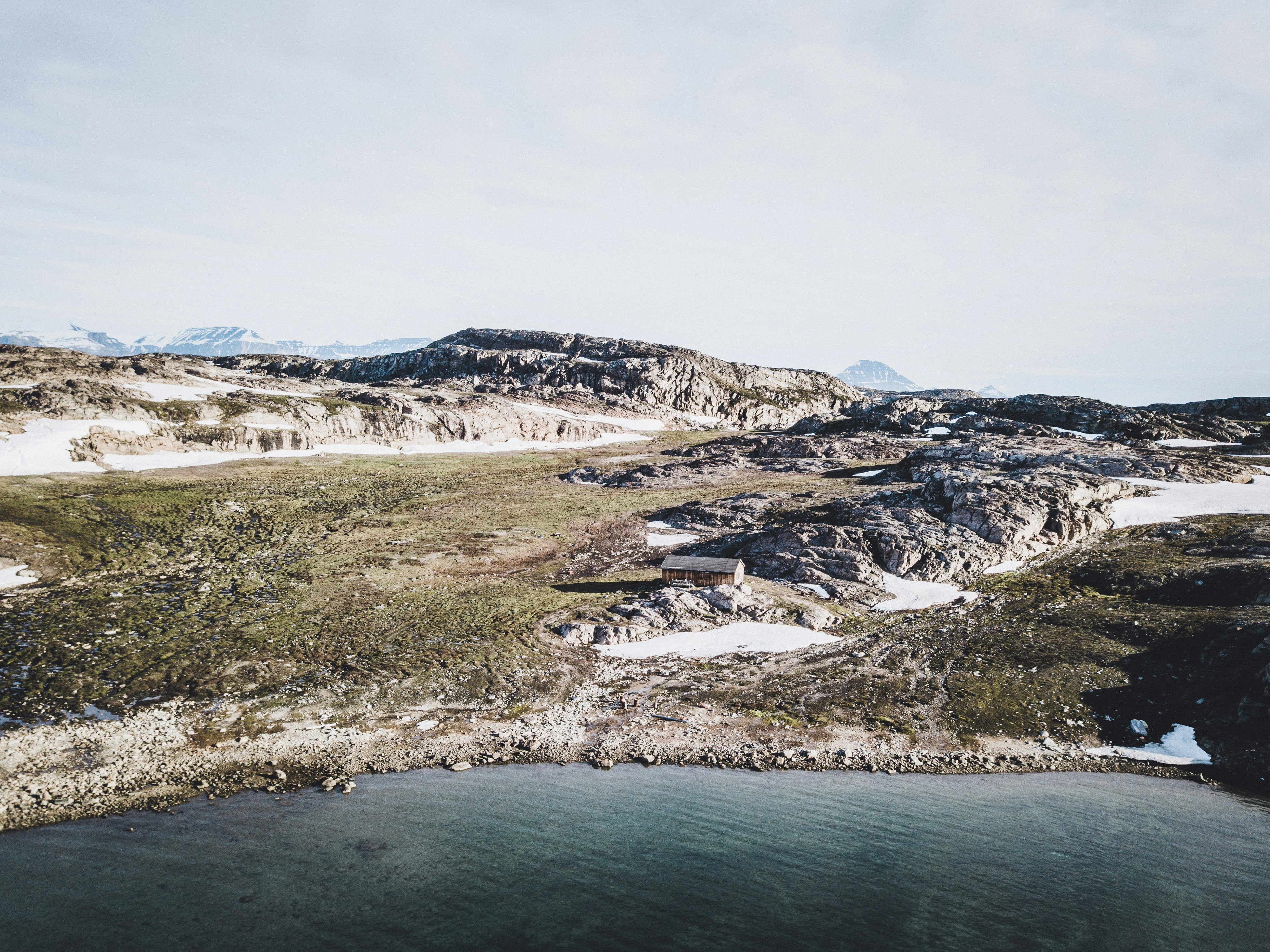 Lone Cabin on Rocky Lakeshore