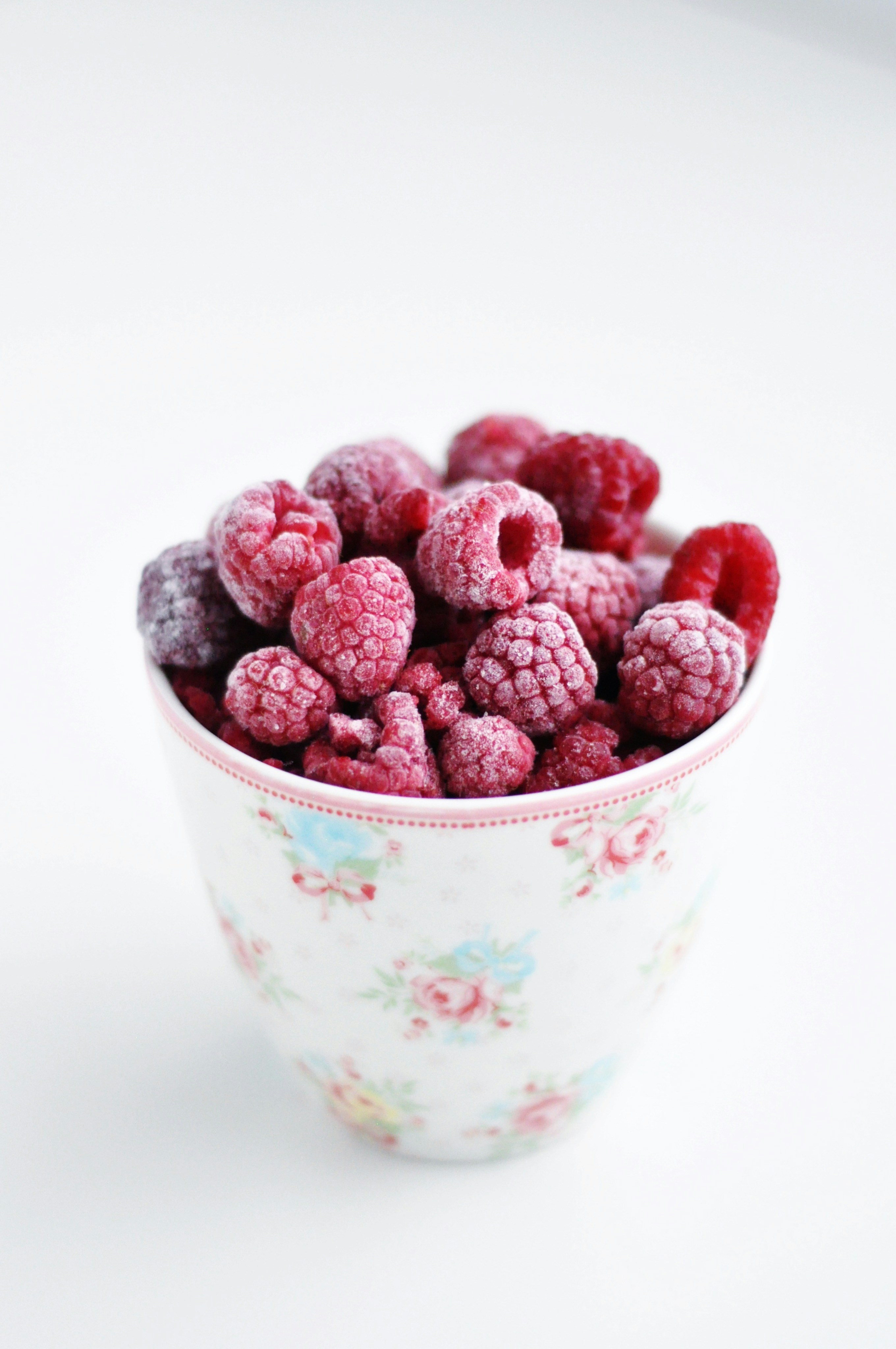 Frozen Raspberries in Floral Cup