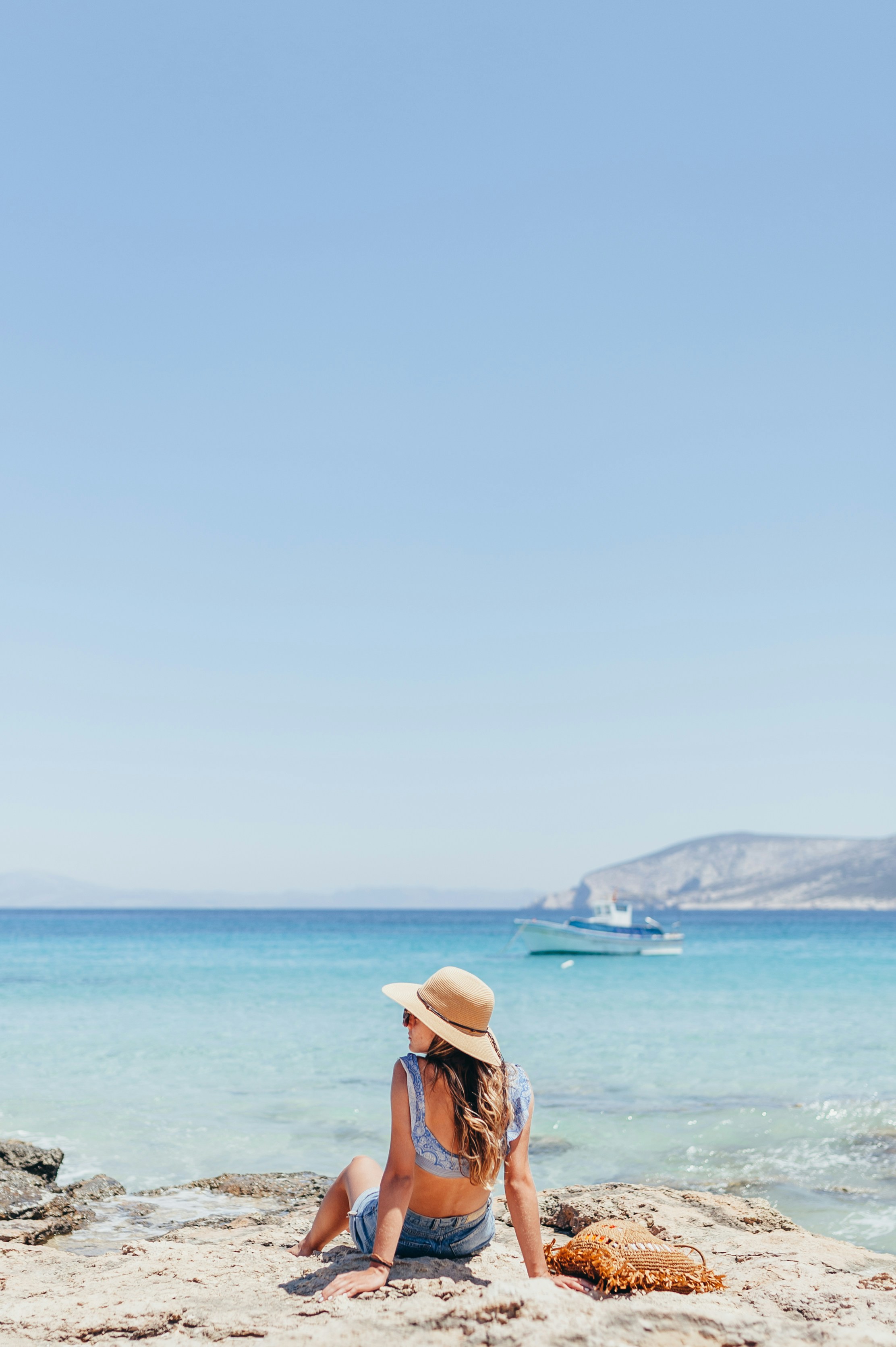 Woman Relaxing by the Seaside