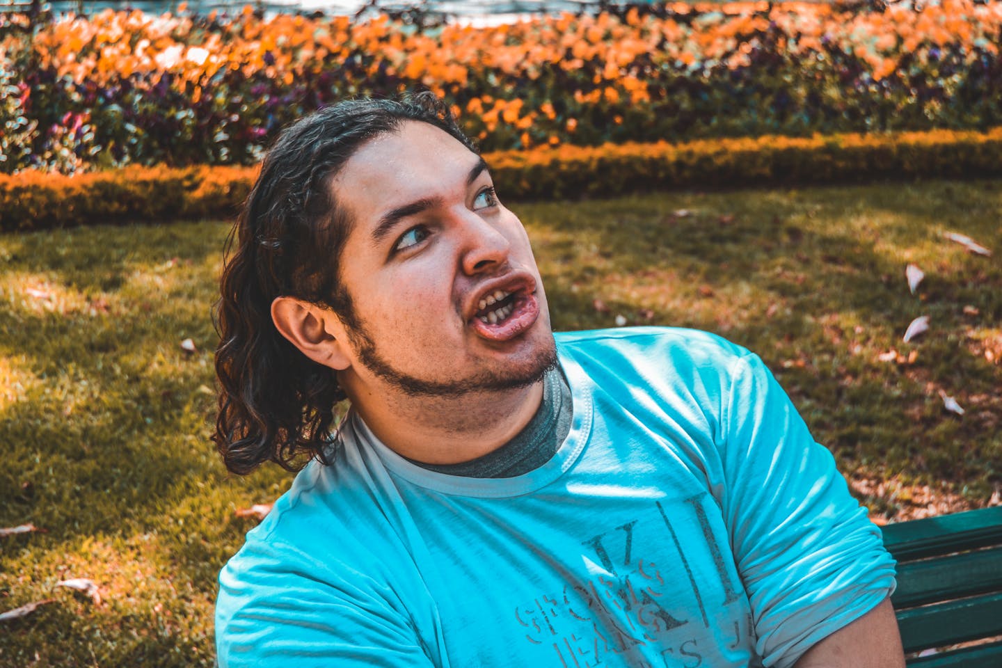 Man Making Funny Face In Park — Funny