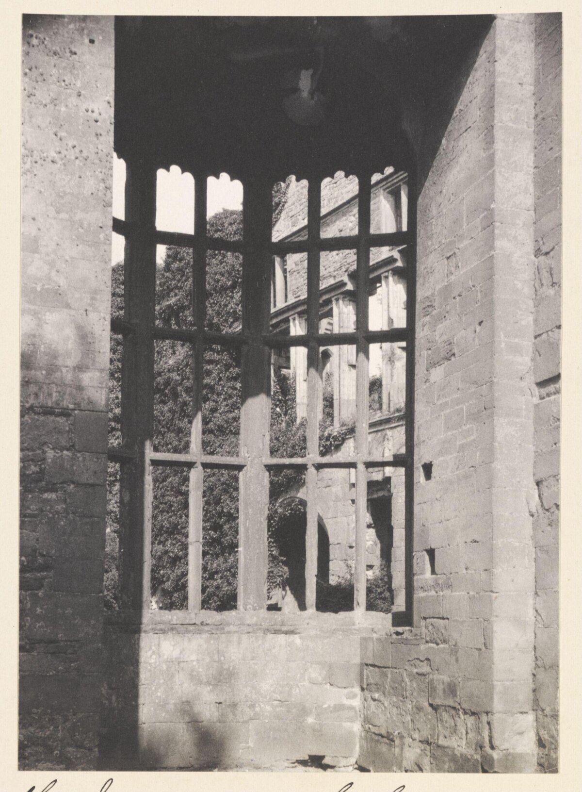 Window View of Ruined Stone Building