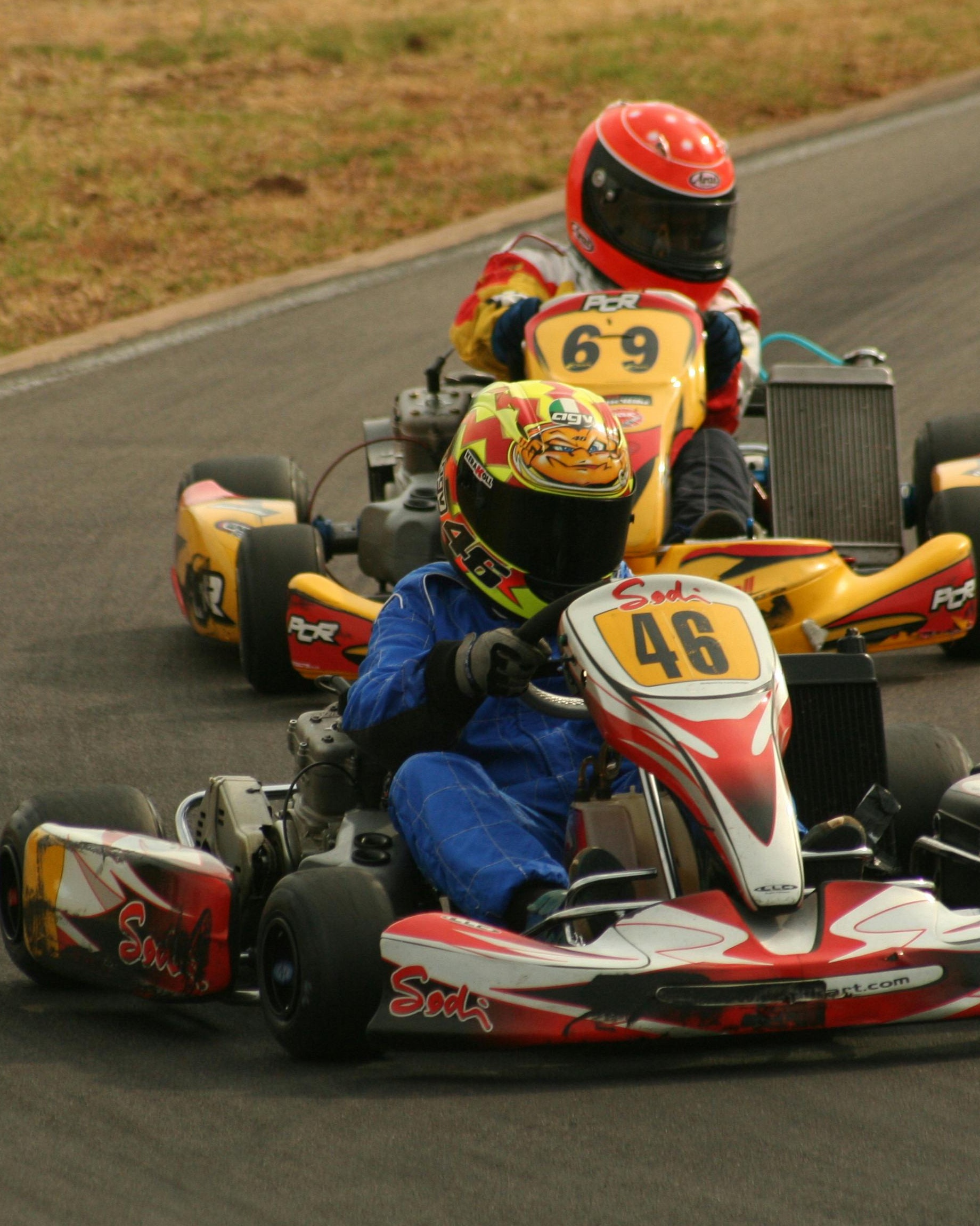 Two Go-Karts Racing on Track