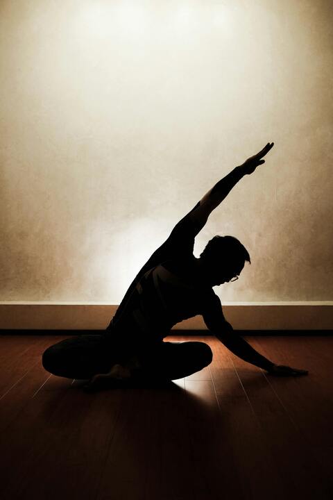 Silhouette of Person Practicing Yoga