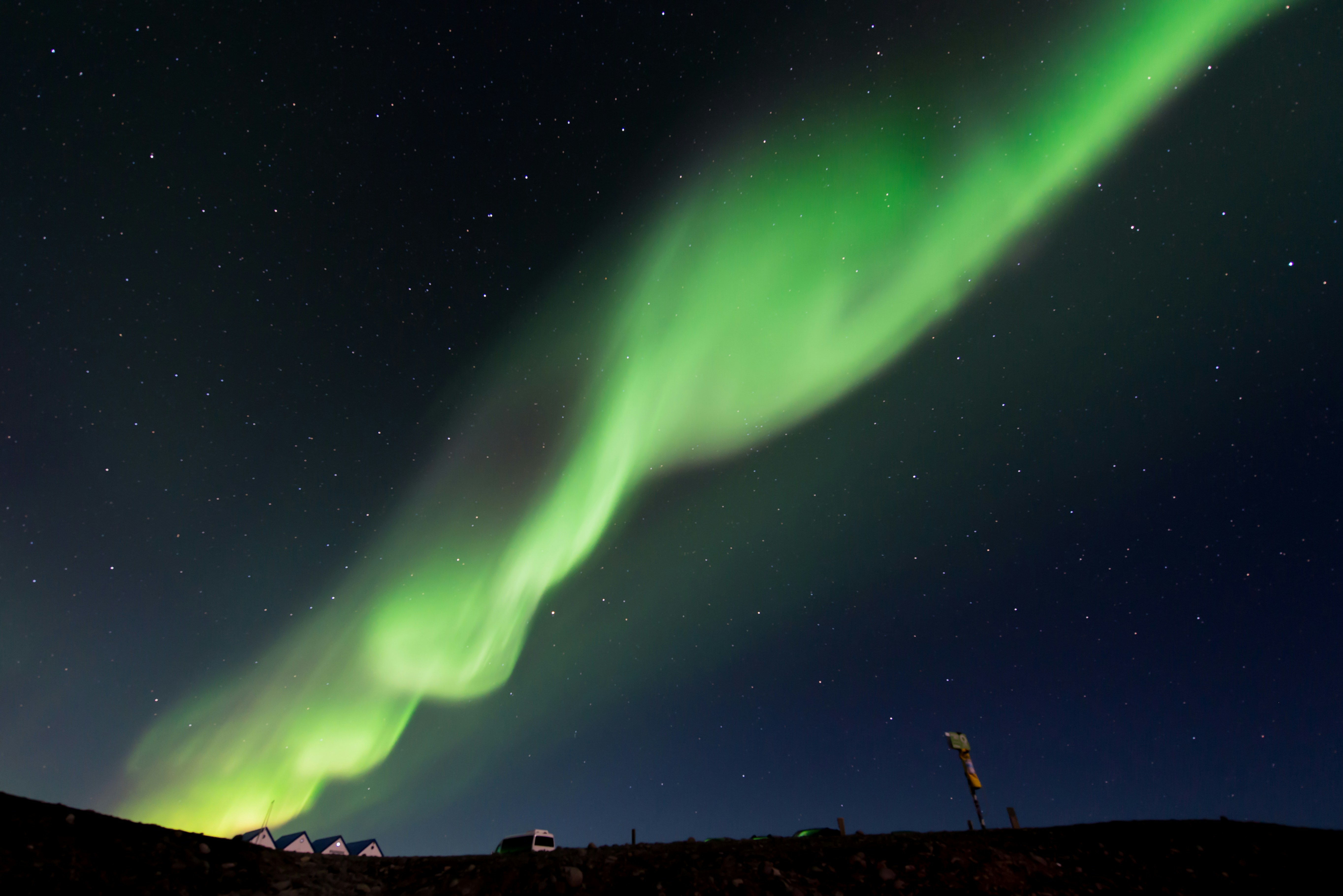 Green Aurora Over Night Sky