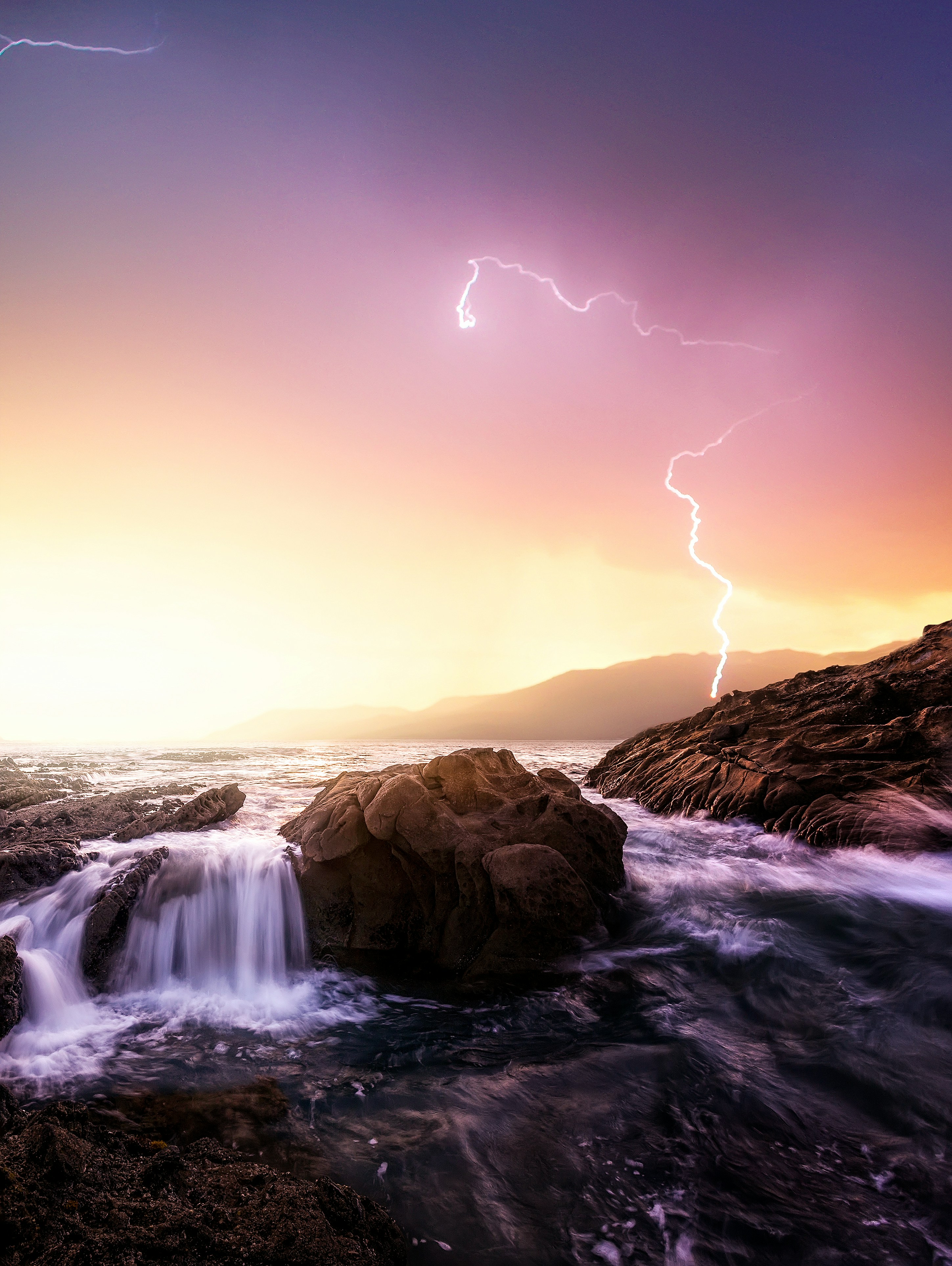 Lightning Over Coastal Rocky Shore