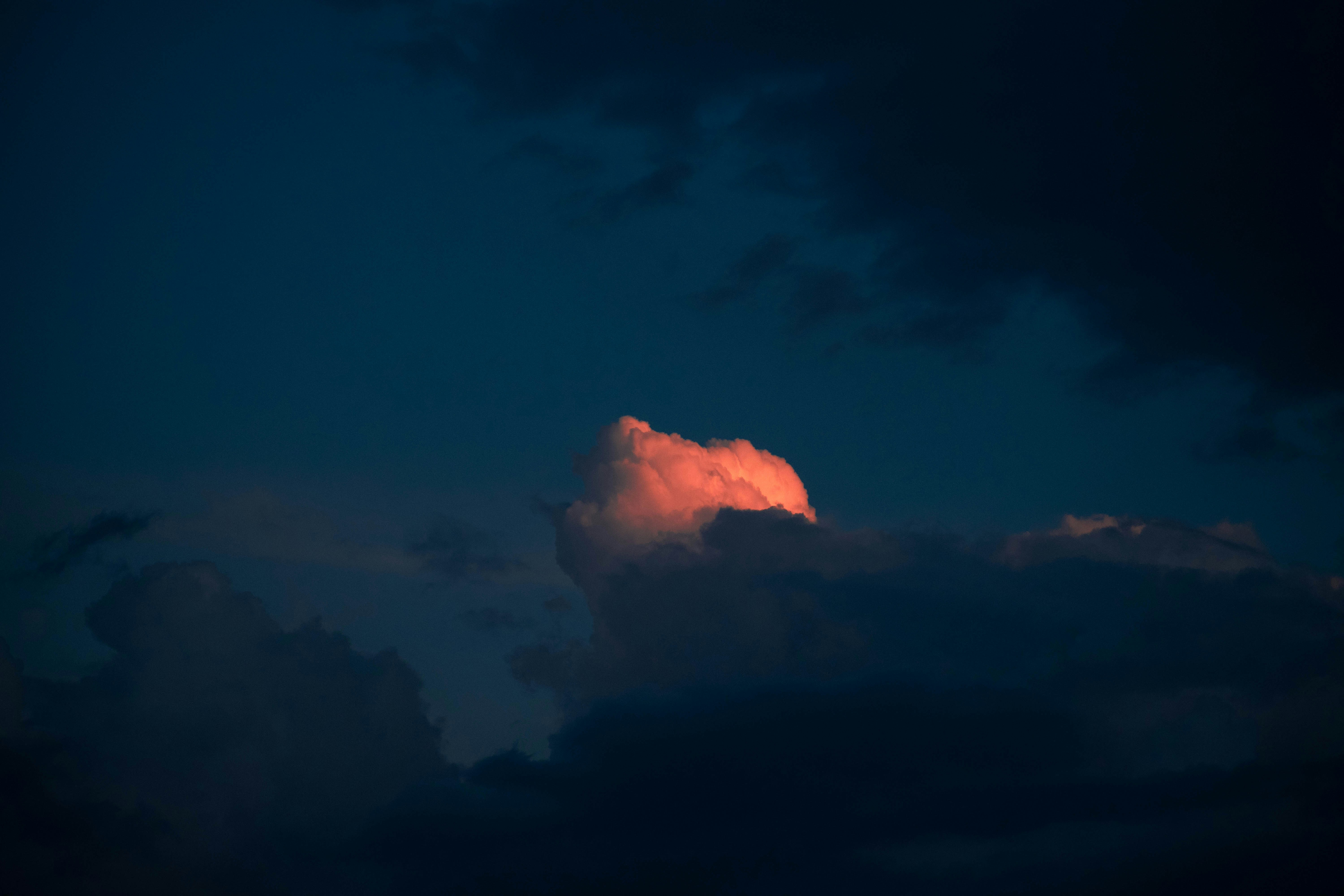 Sunlit Cloud in Dark Sky