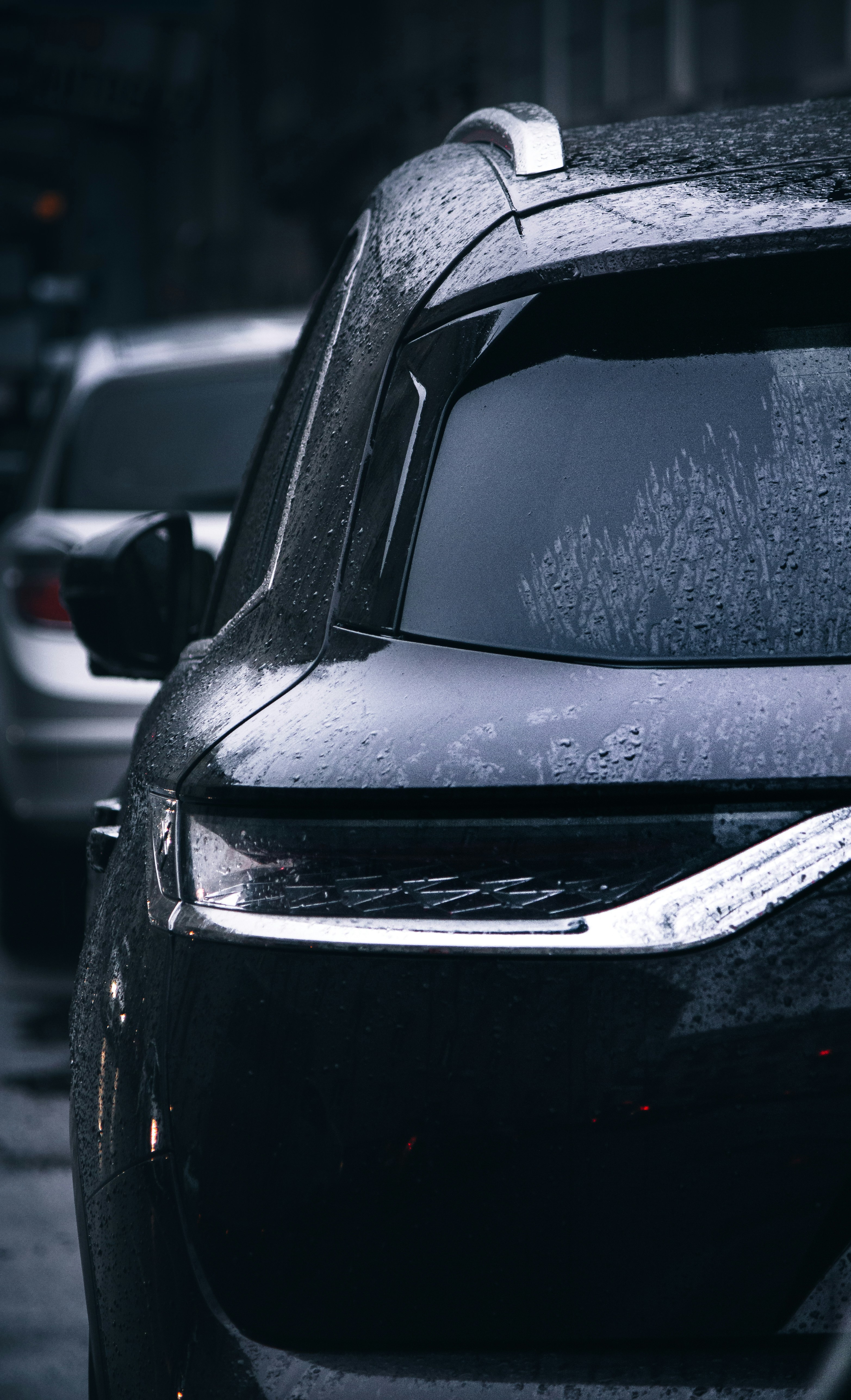 Black SUV on Rainy Day