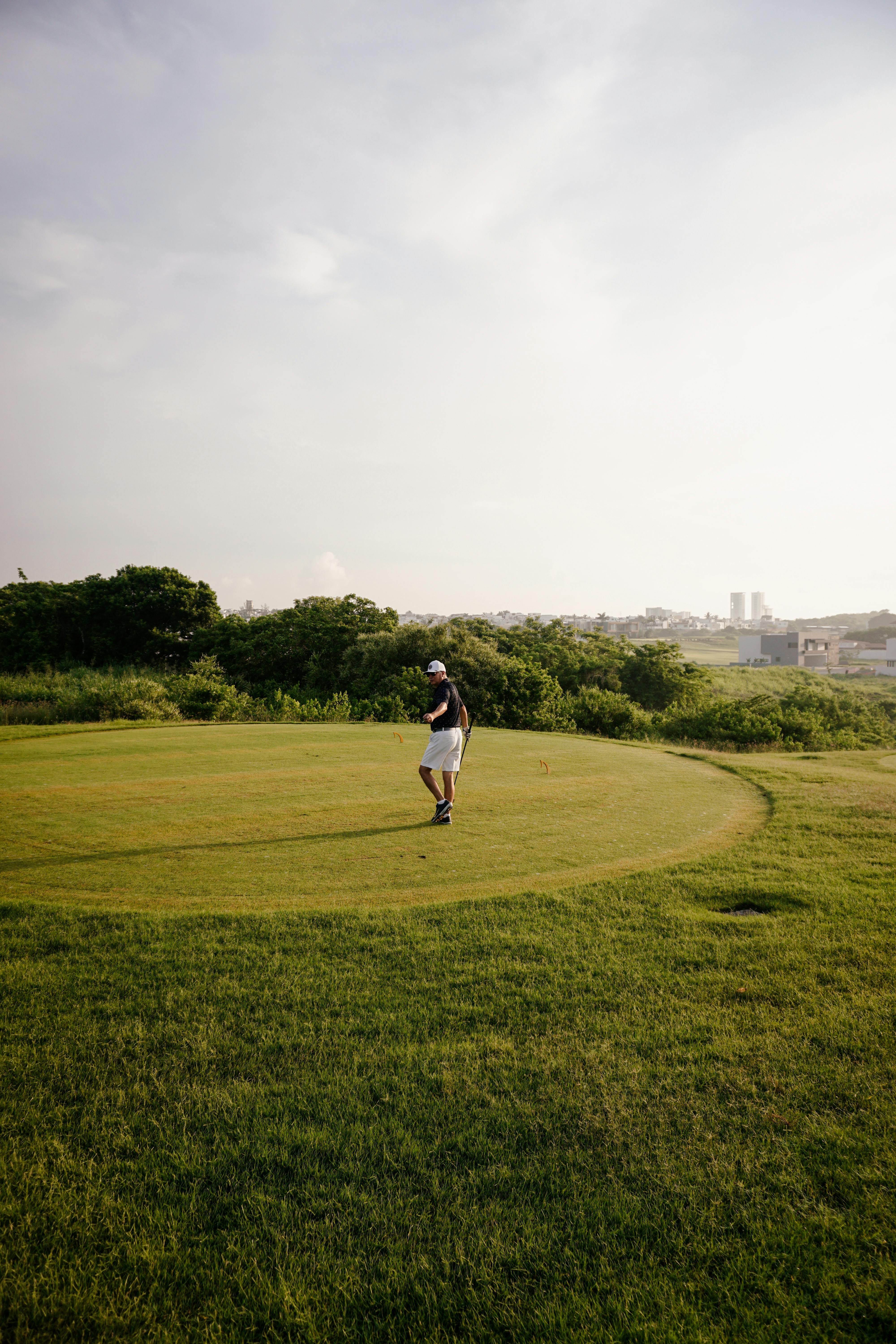 Golfer on a Scenic Golf Course