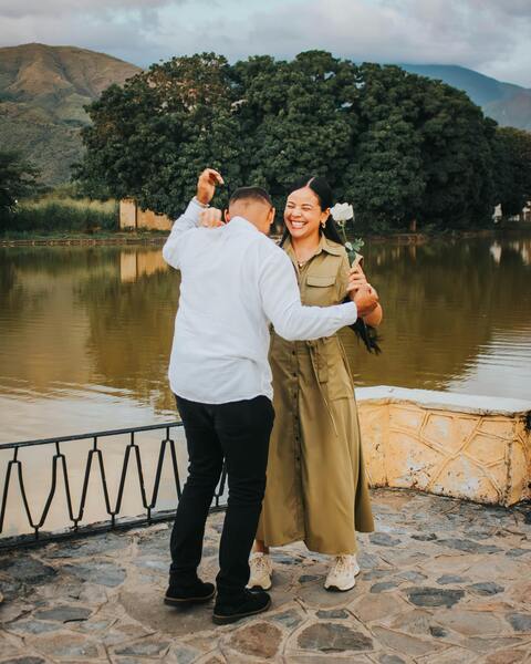 Happy Couple Dancing by Lake