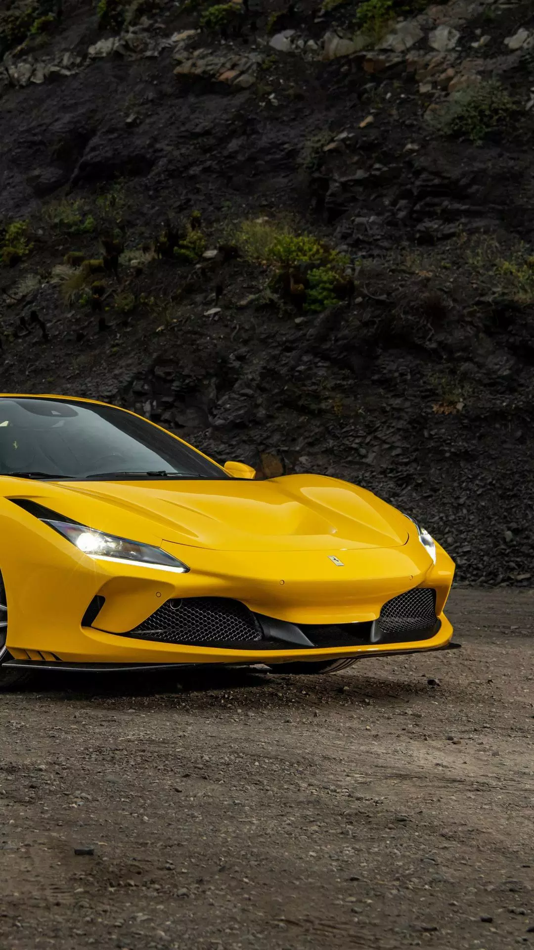 Yellow Ferrari on Dirt Road