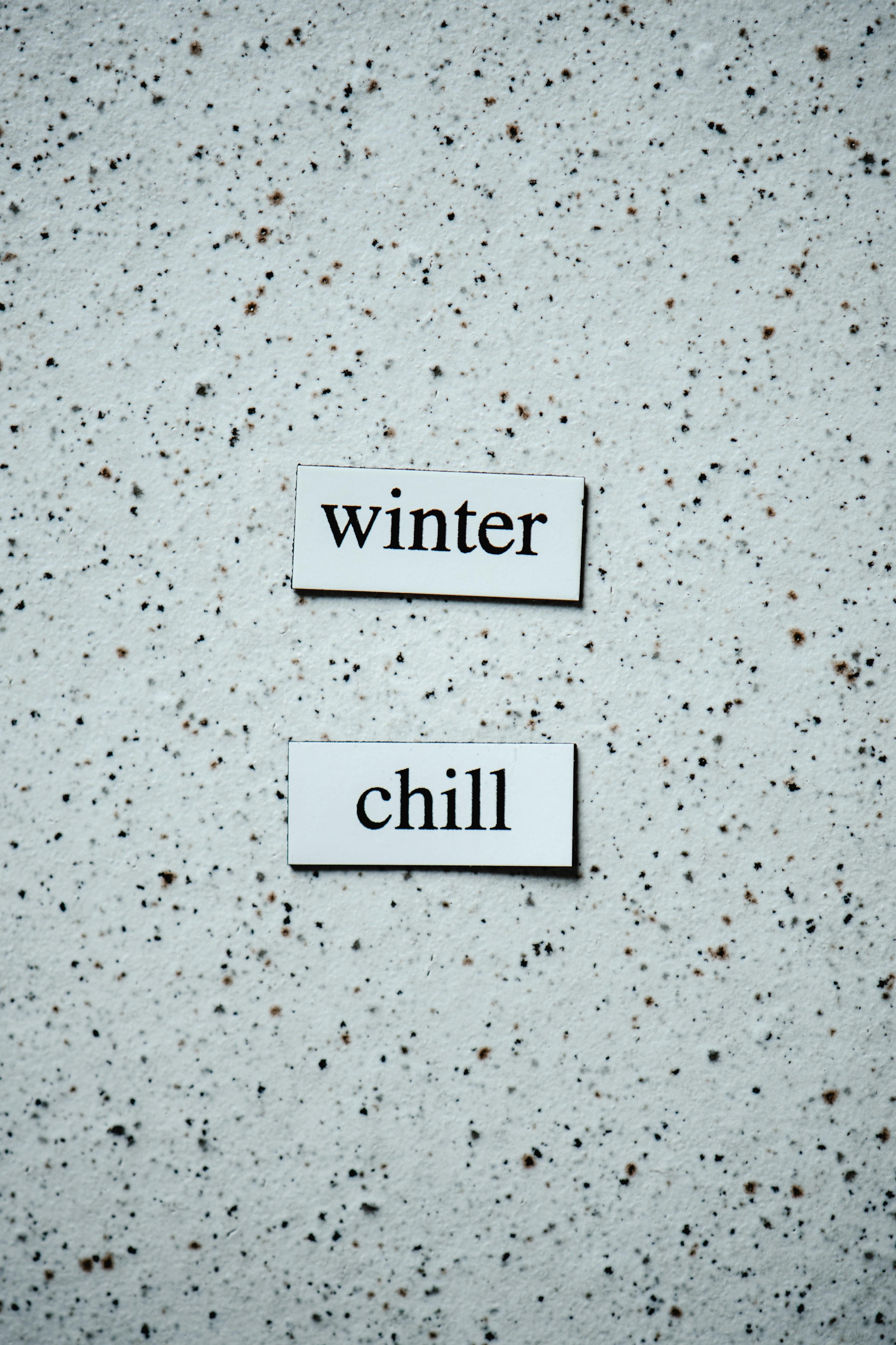 Winter Chill Text on Speckled Background