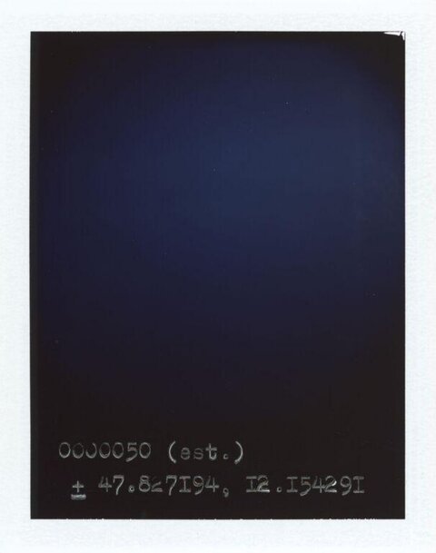 Dark Polaroid With Handwritten Coordinates