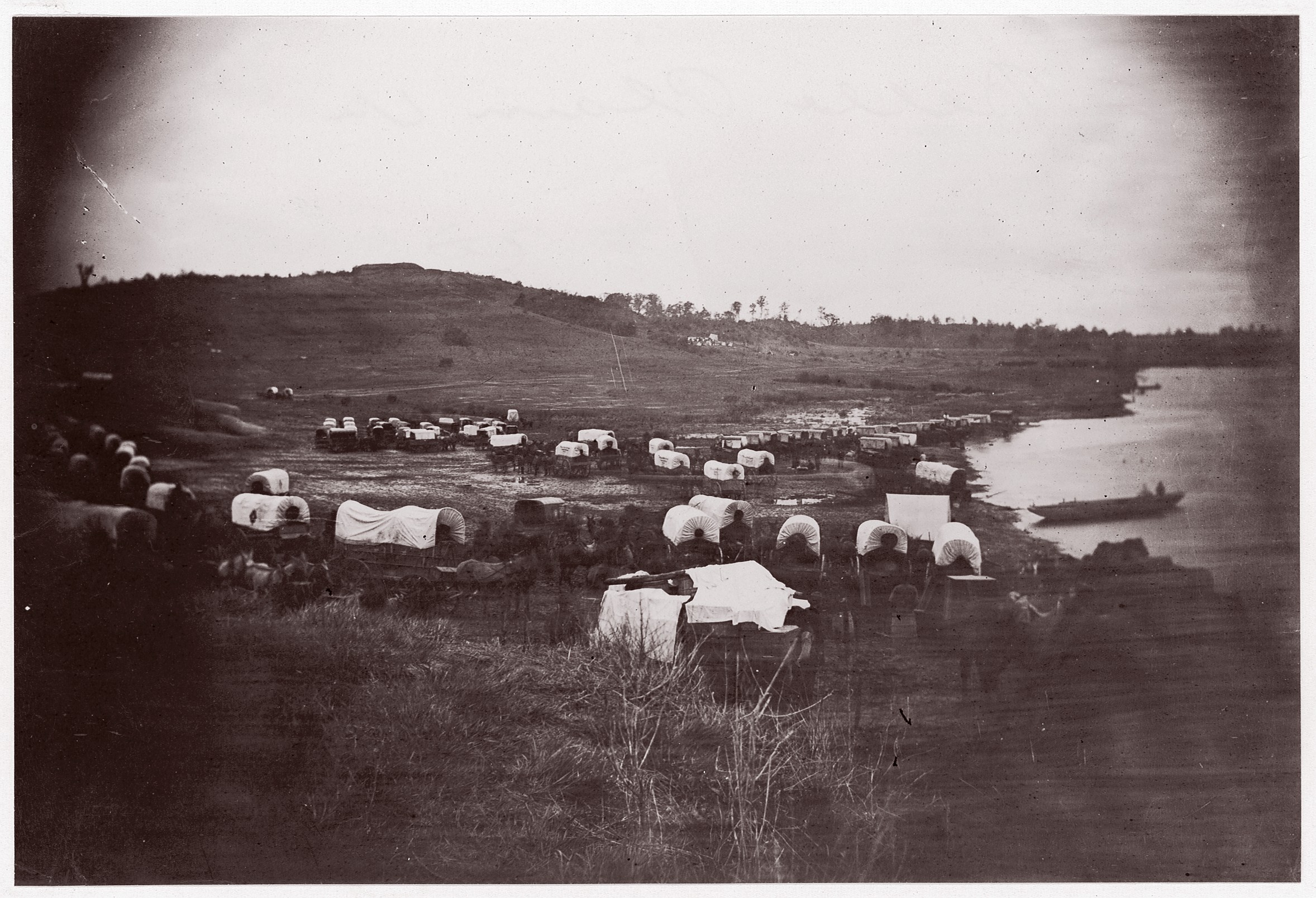 Covered Wagon Camp by River
