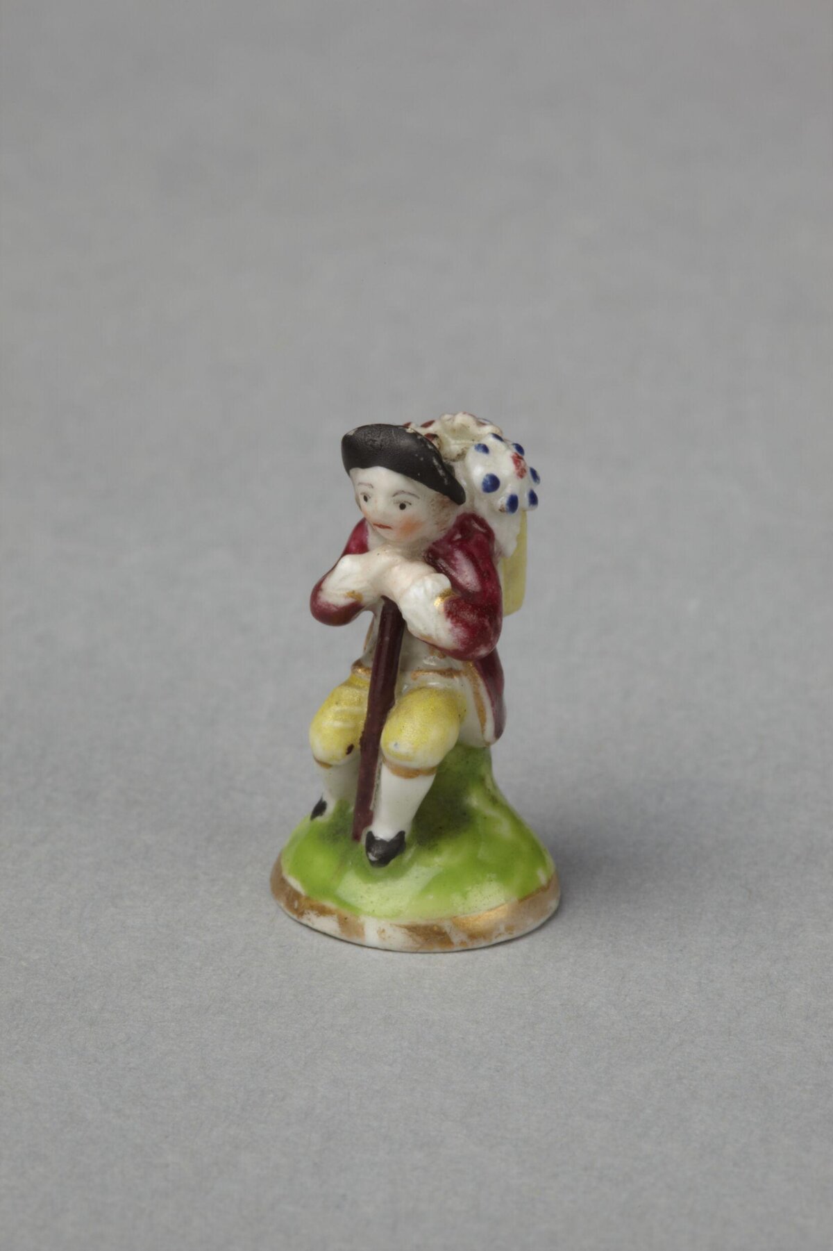Miniature Porcelain Traveler Figurine
