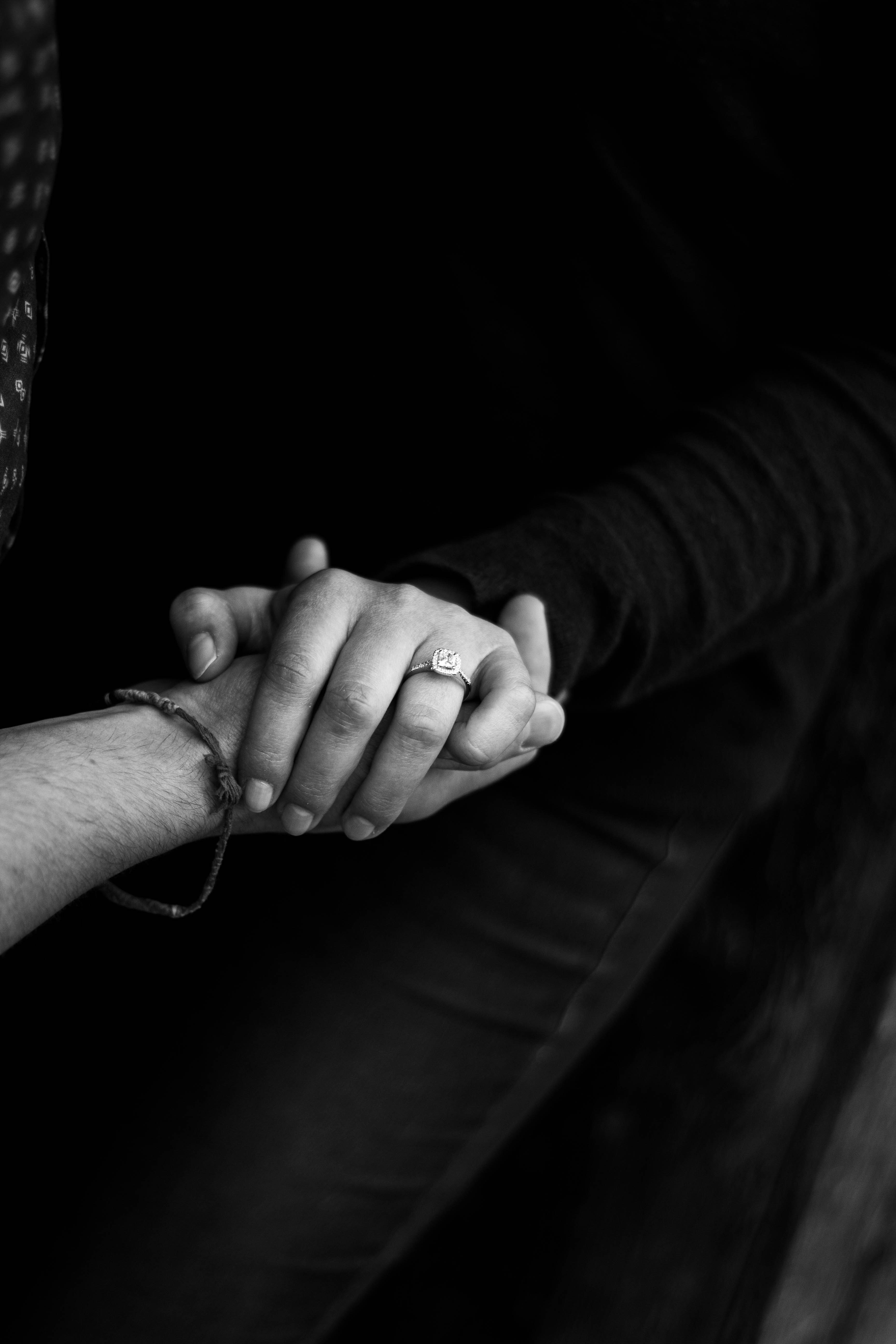 Engaged Couple Holding Hands