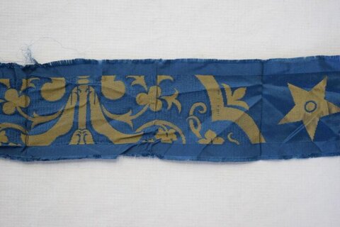 Blue and Gold Patterned Fabric Fragment