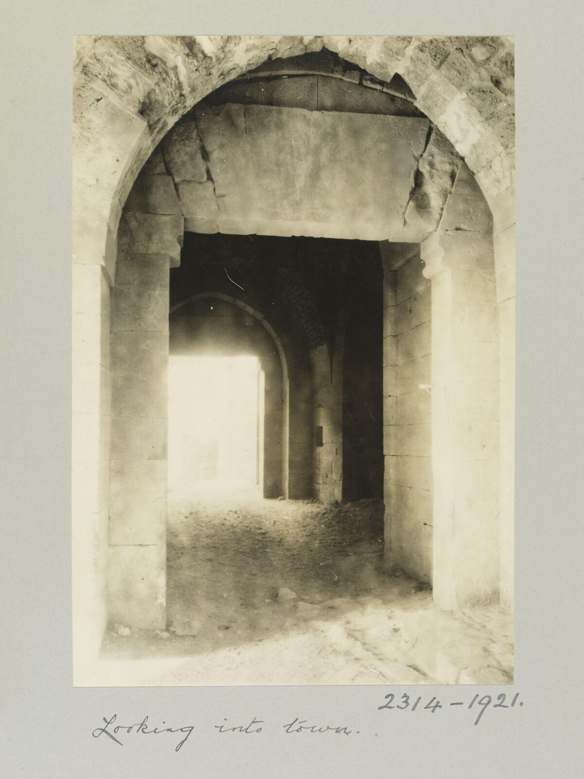 Looking Into Town Through Old Gate