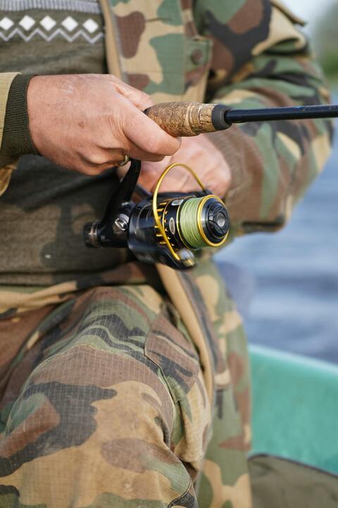 Close Up of Angler Holding Fishing Rod