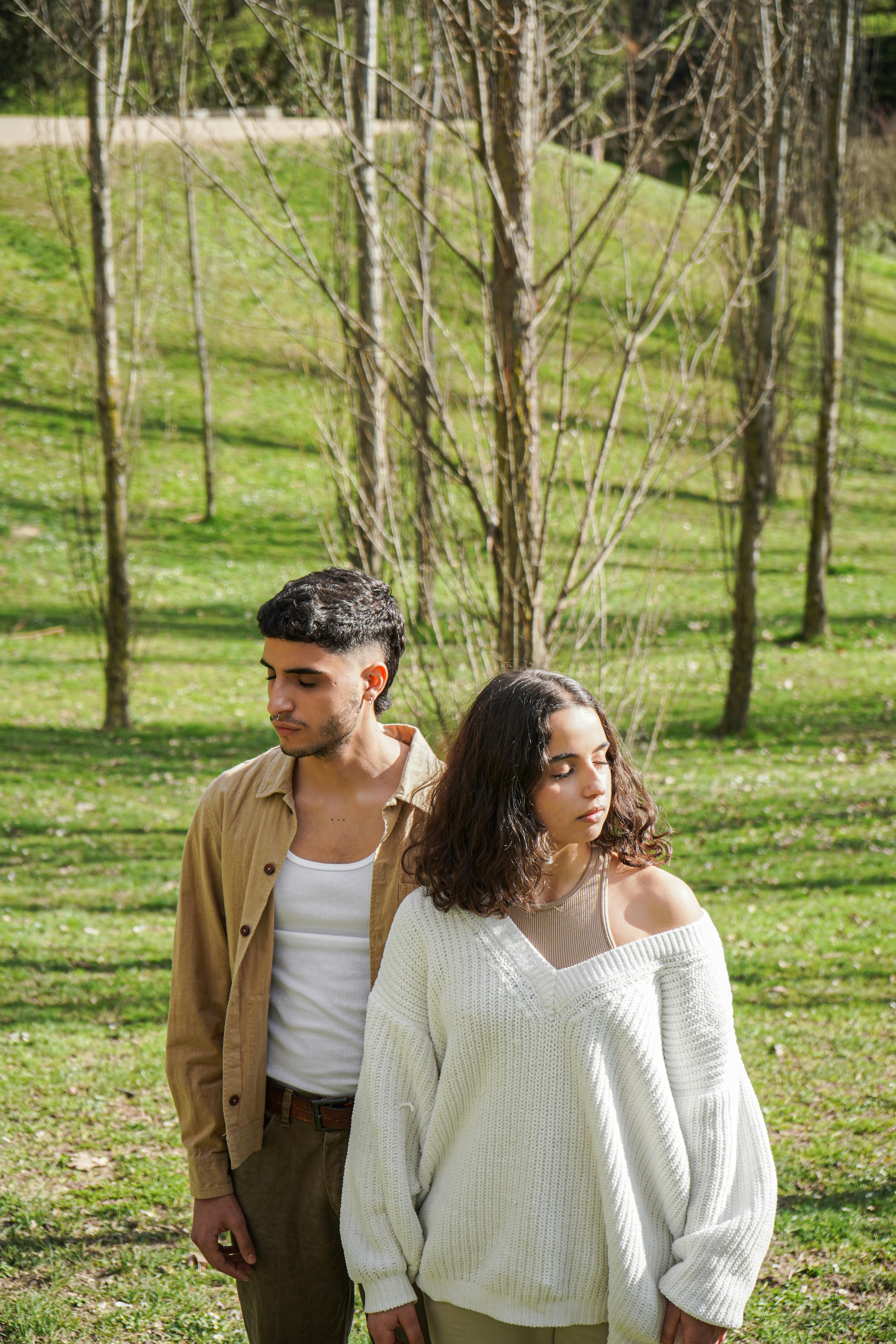 Young Couple Standing In Park