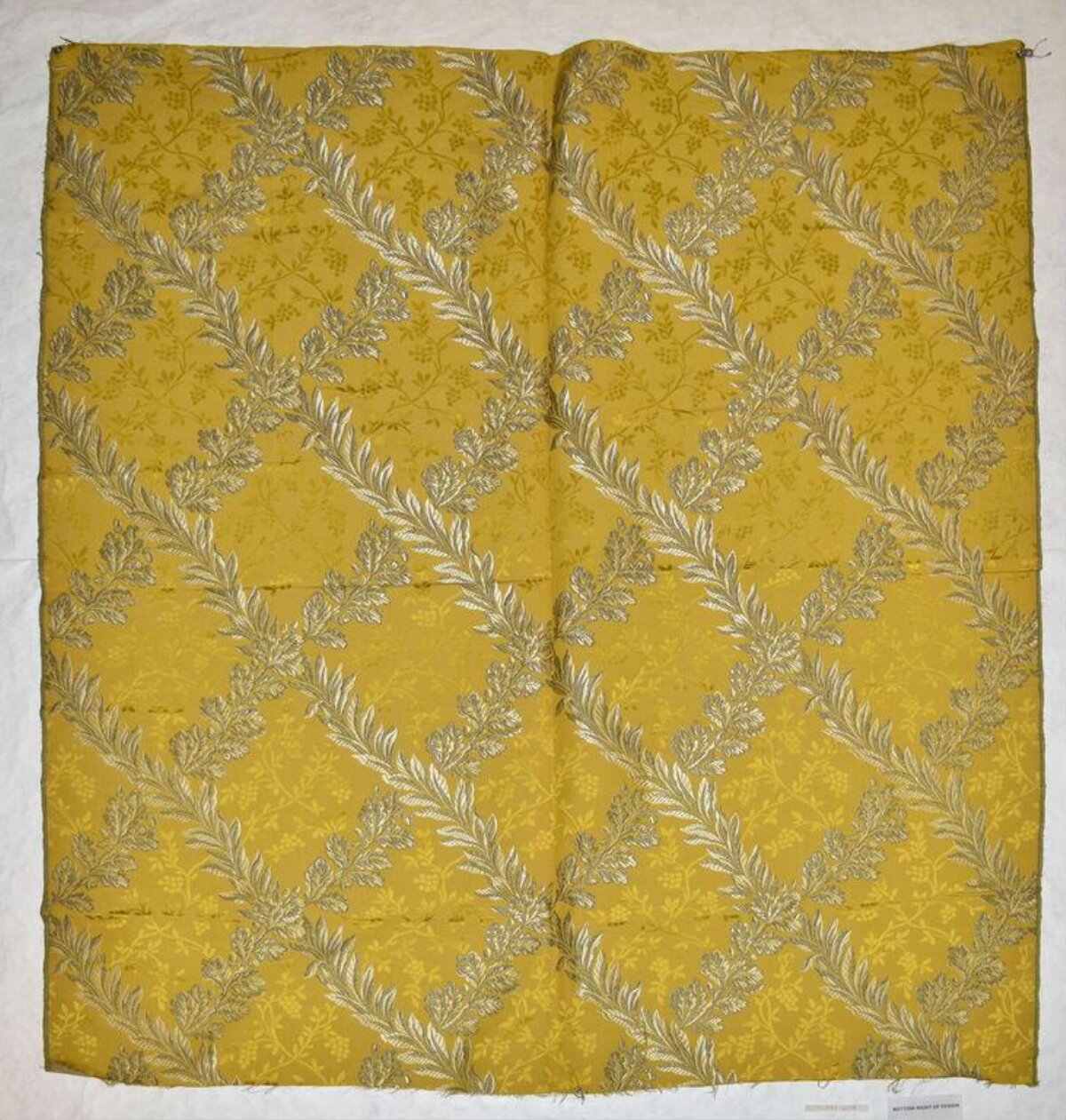 Yellow Embroidered Leaf Pattern Fabric