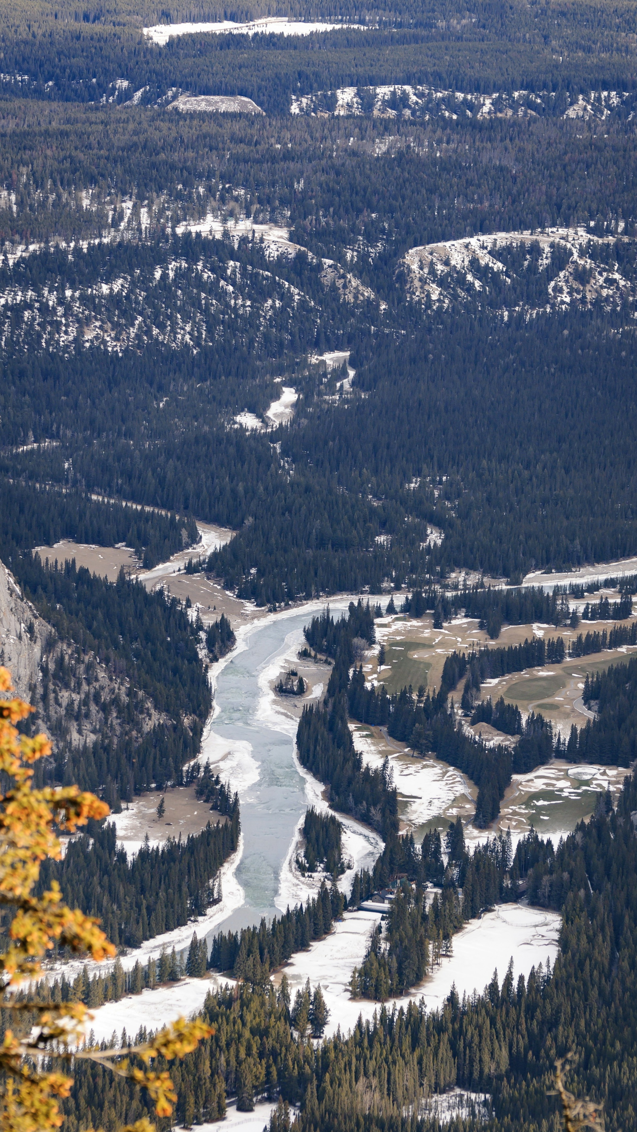 Aerial View of Snowy Mountain River Valley
