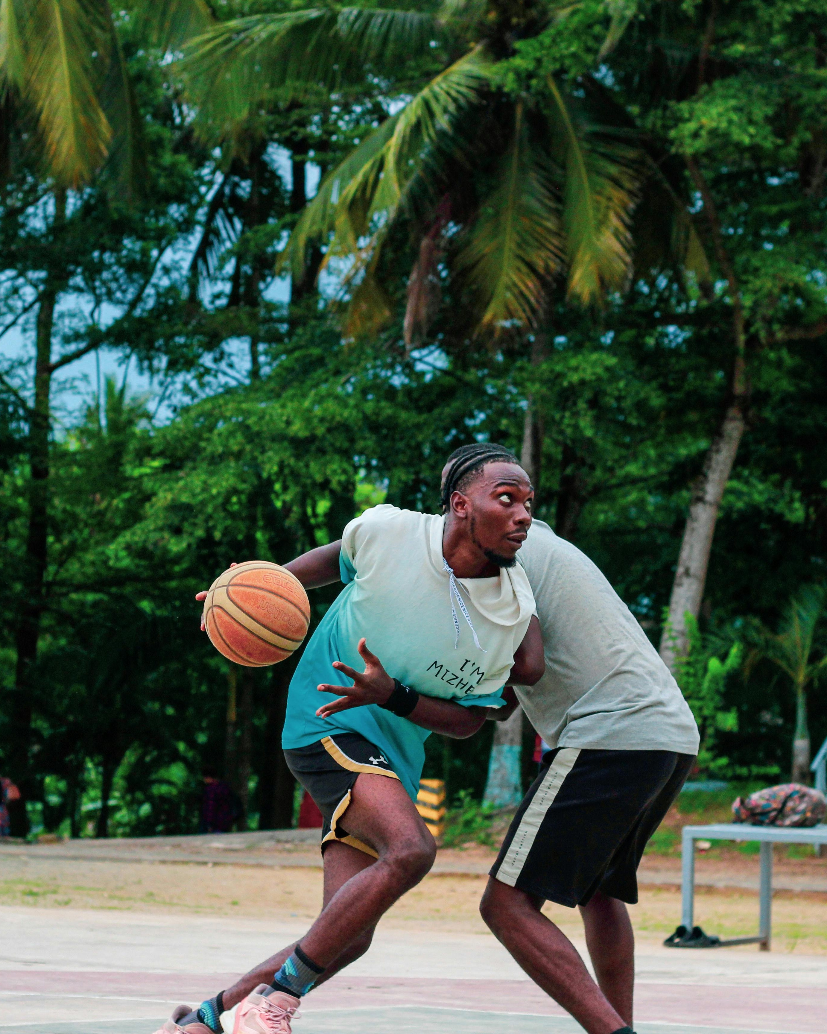 Two Men Playing Outdoor Basketball