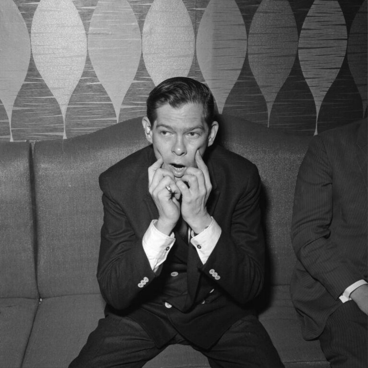 Man in Suit Making Exaggerated Face