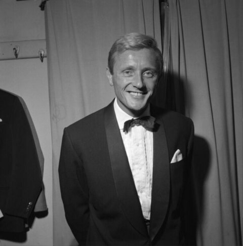 B&W Portrait of Smiling Man in Tuxedo