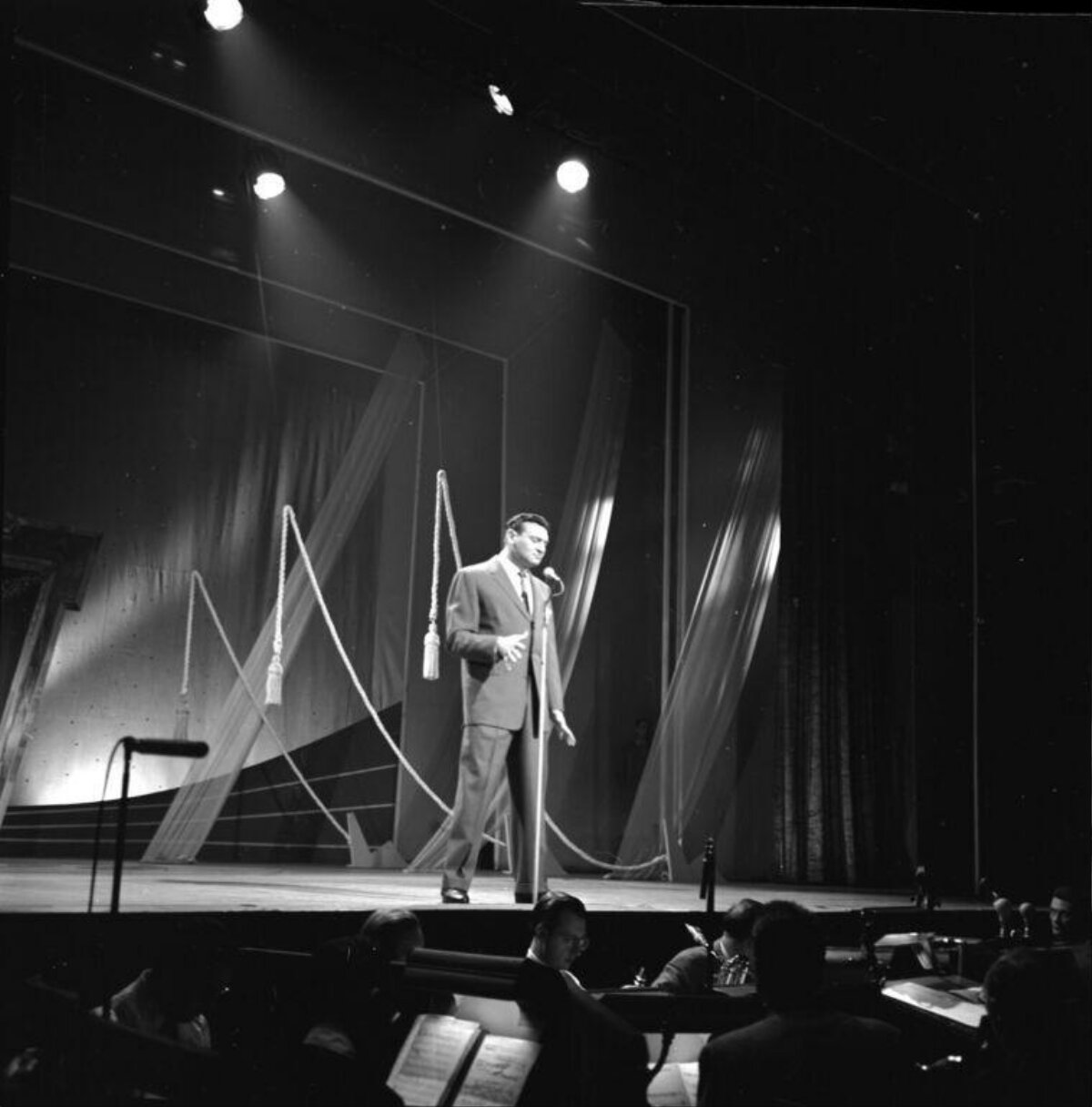 Male Singer Performing on Stage