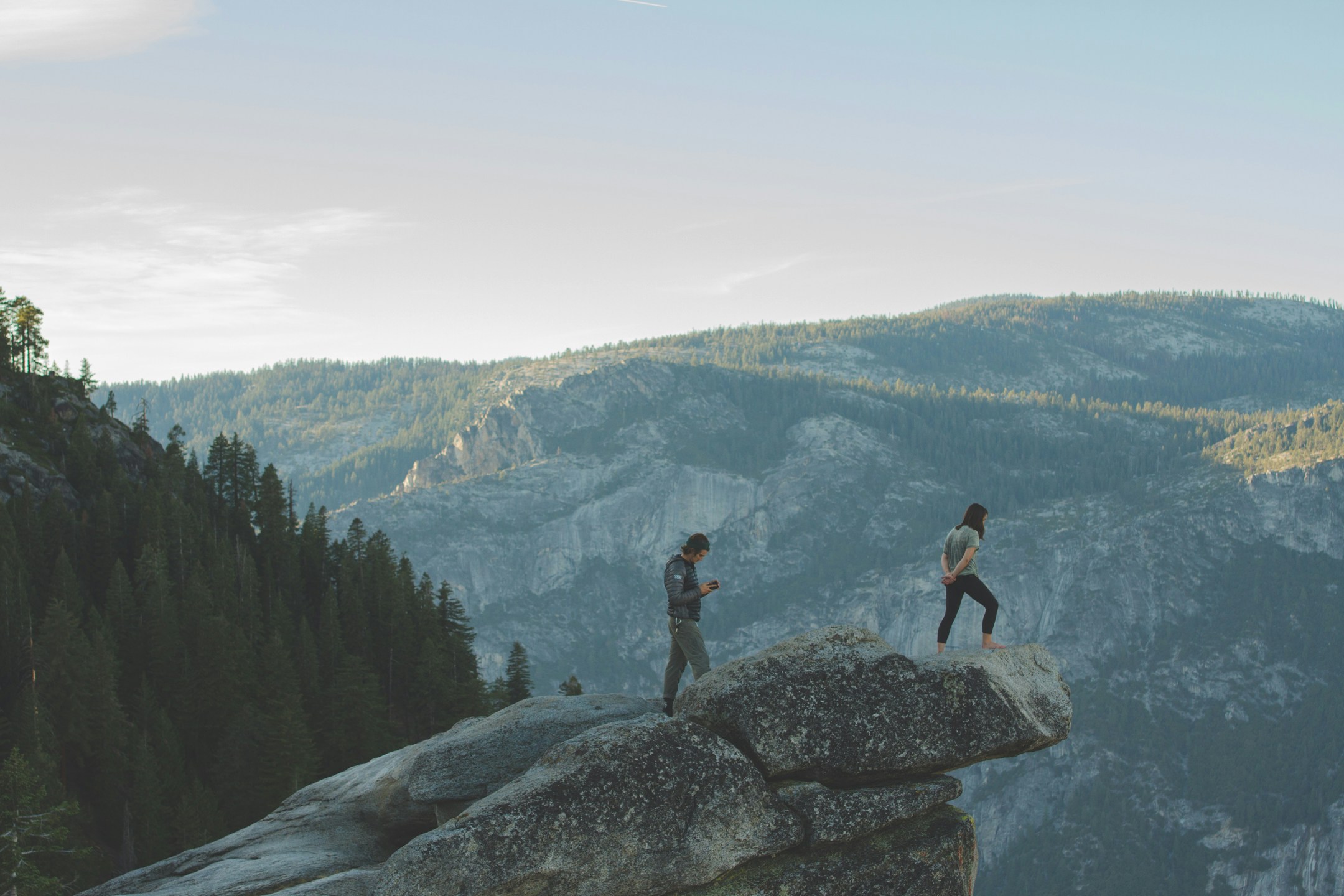 Two Hikers on Mountain Overlook