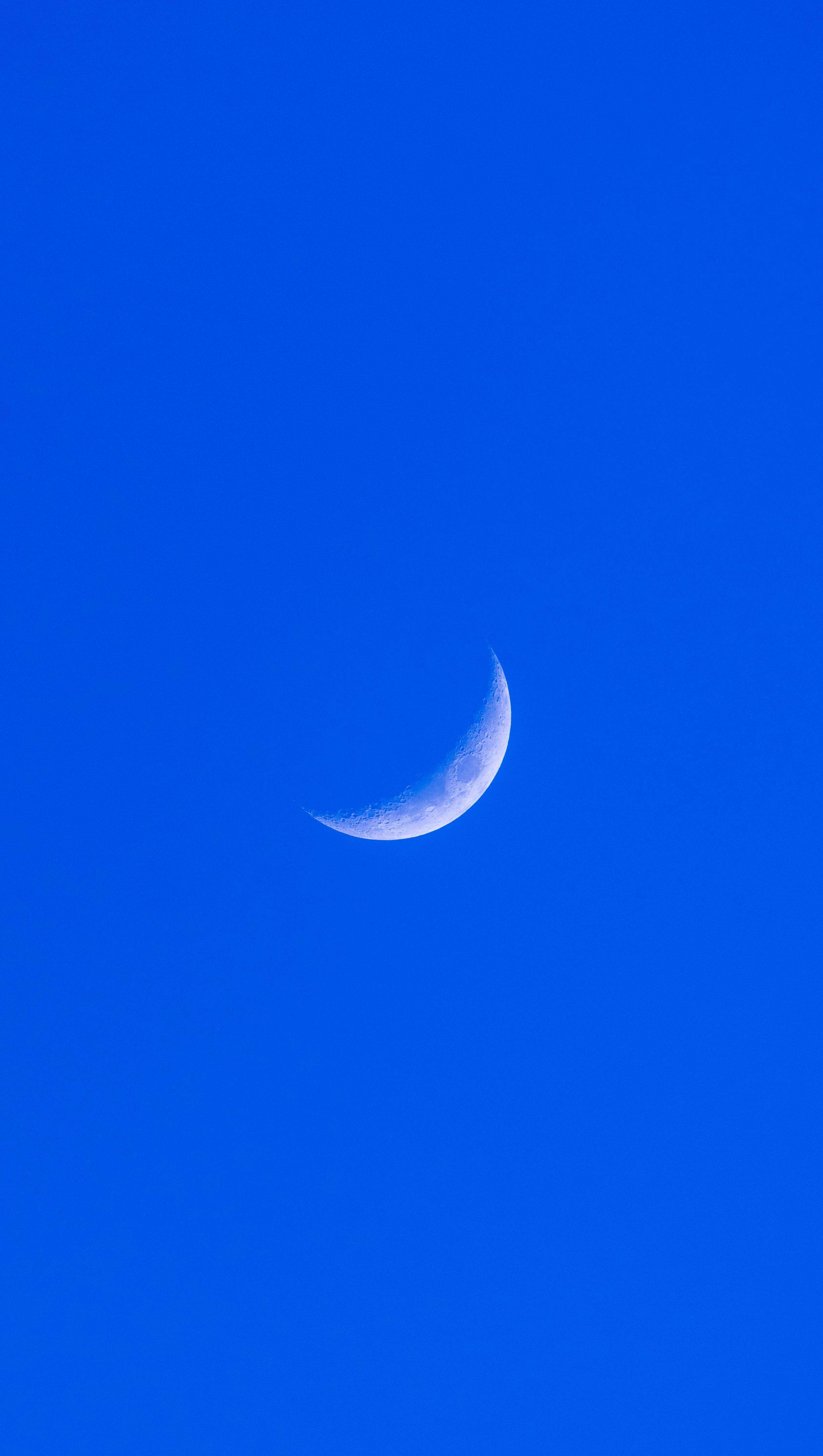 Crescent Moon in Clear Blue Sky